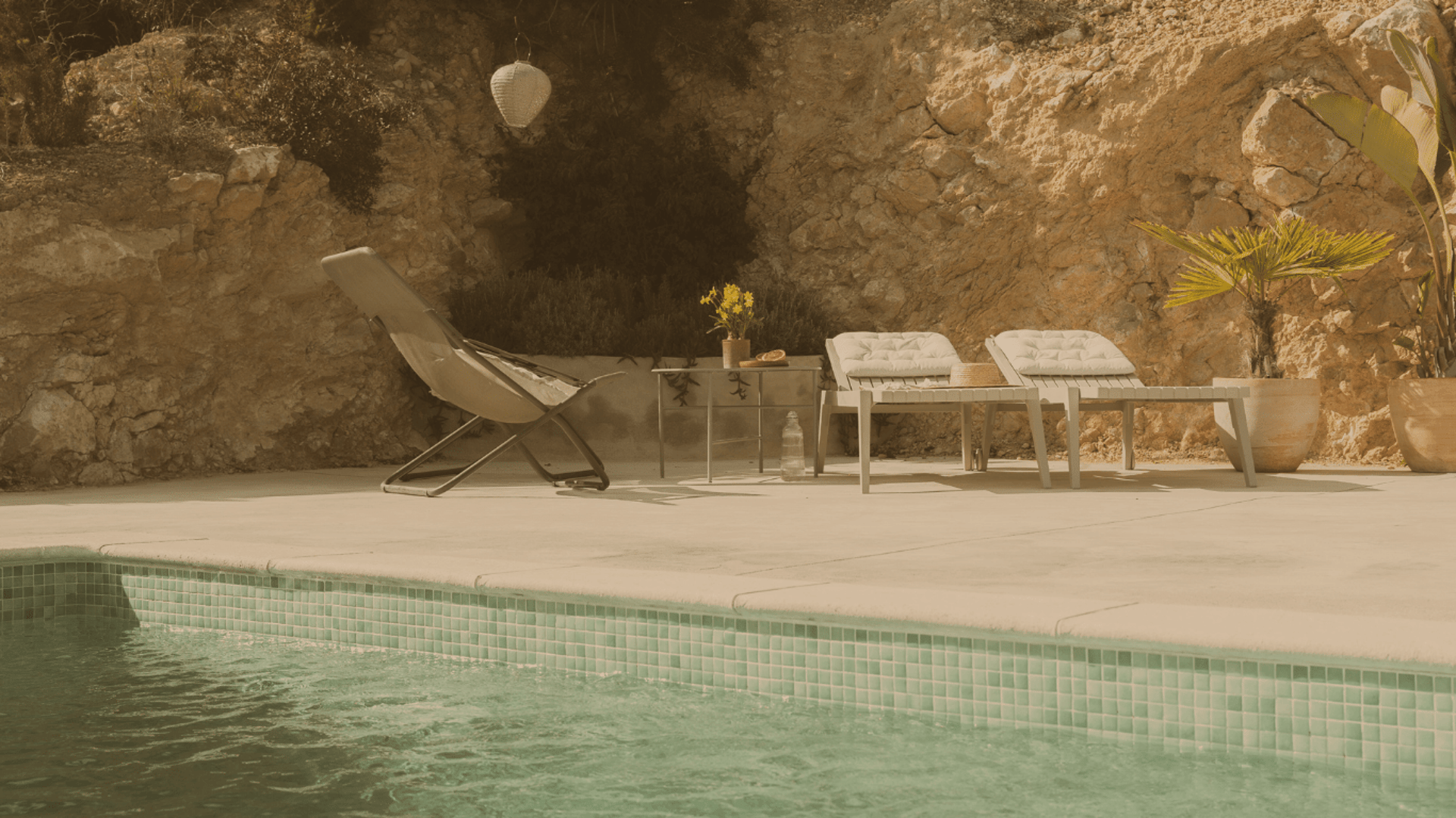 two black suede armchairs during daytime