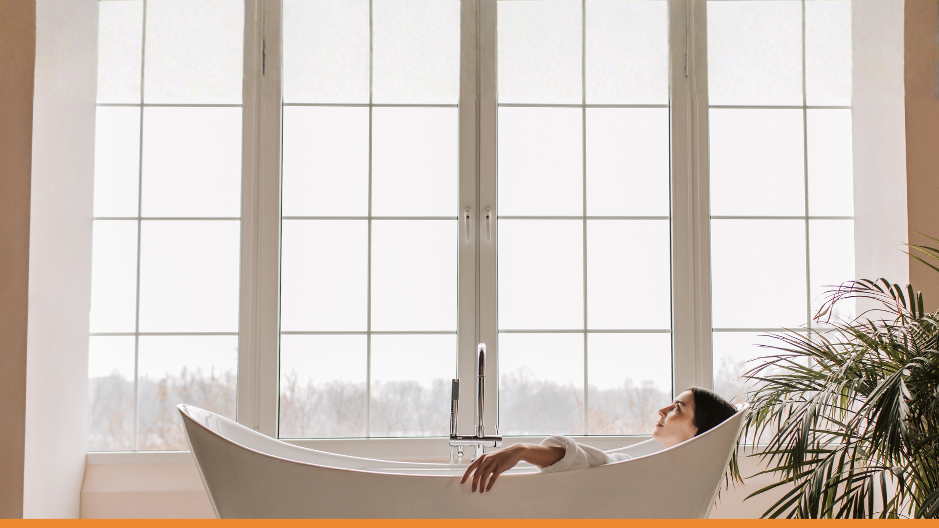 an abstract photo of a curved building with a blue sky in the background