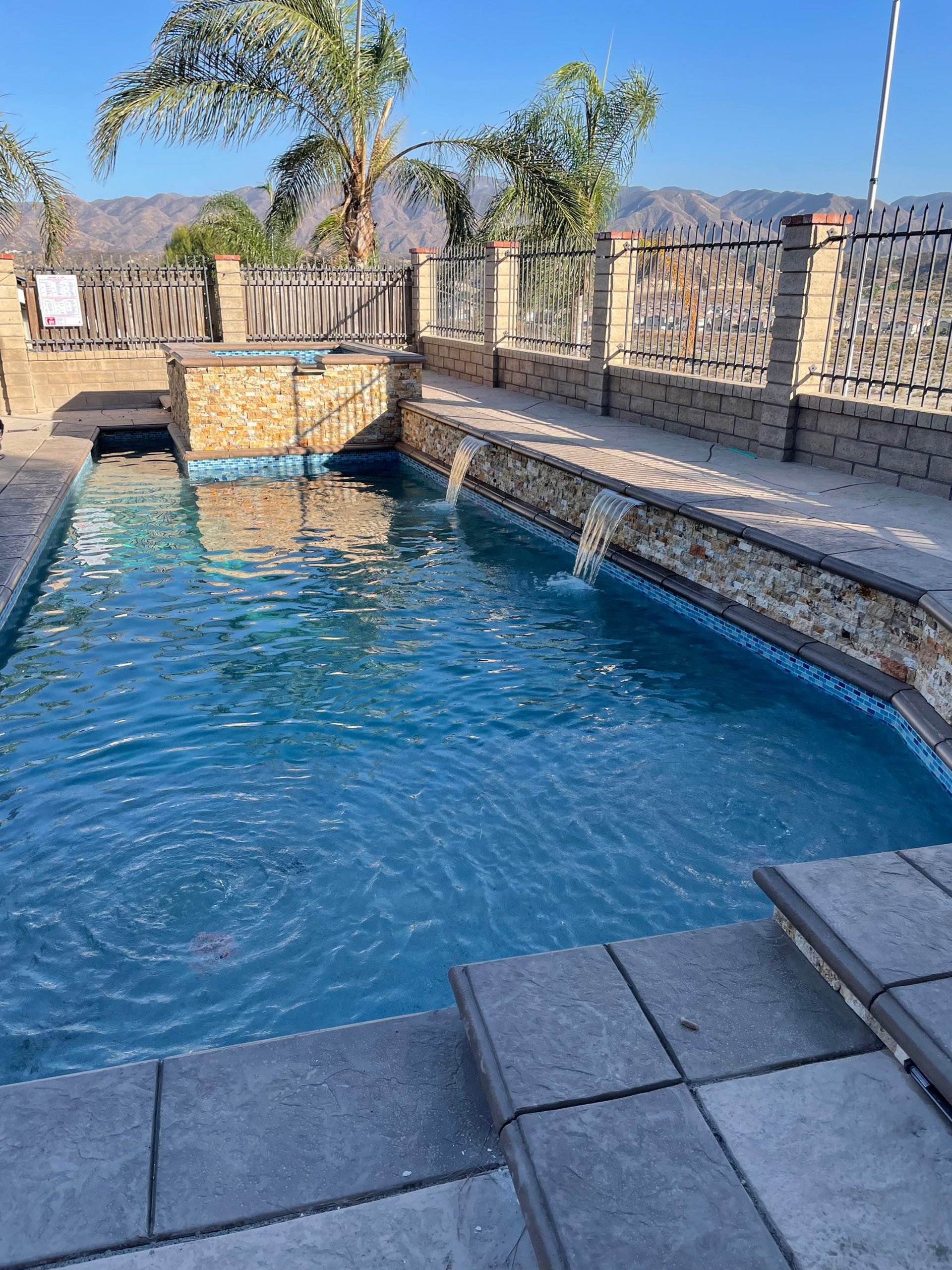 woman wearing yellow long-sleeved dress under white clouds and blue sky during daytime