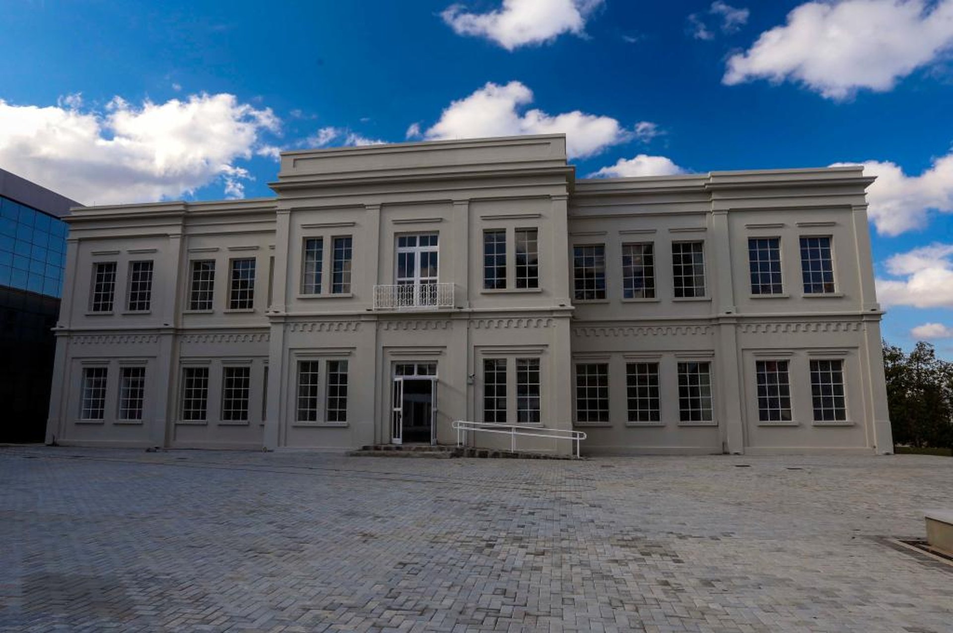 person using laptop on white wooden table