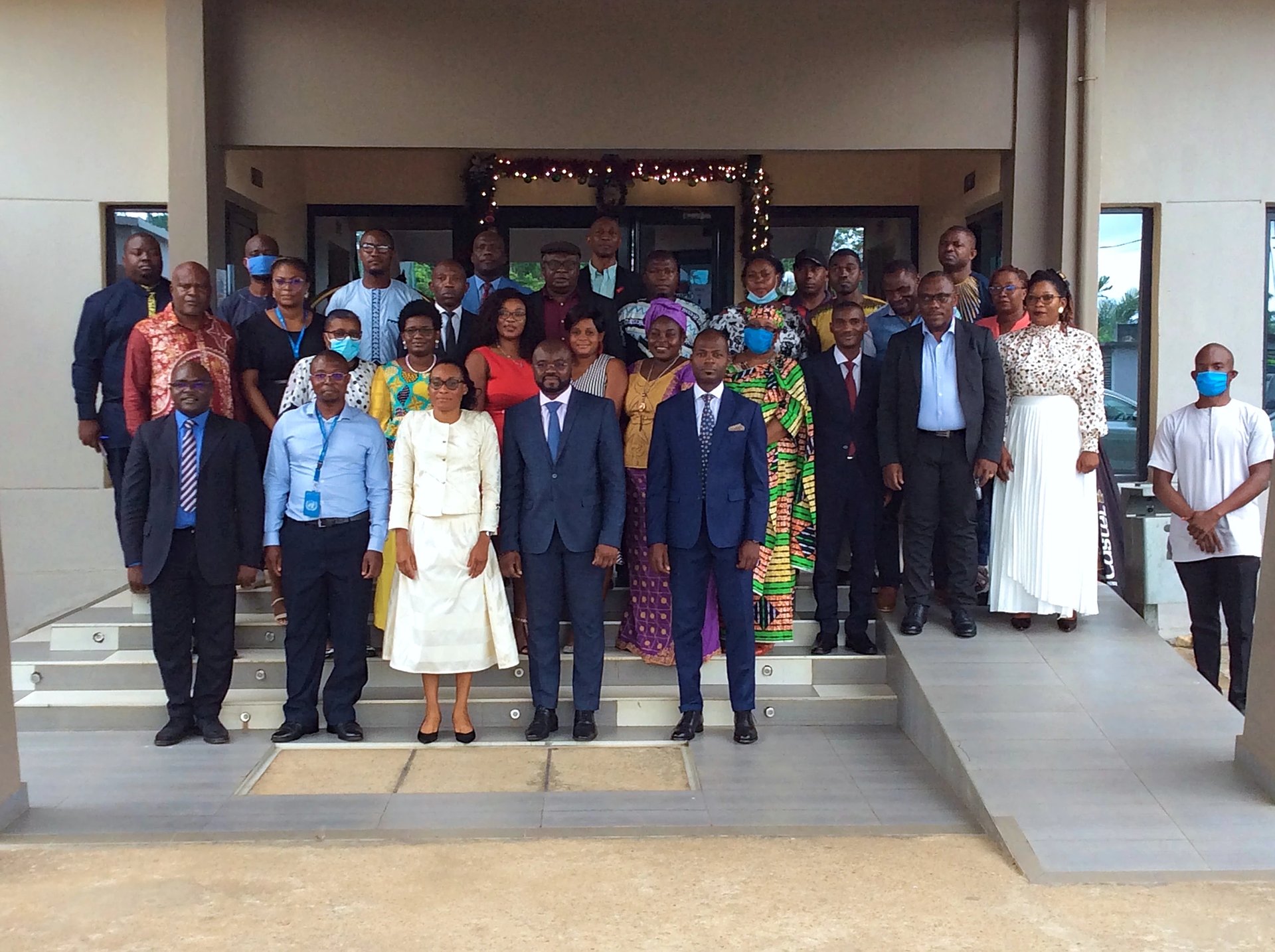 black and brown leather padded tub sofa