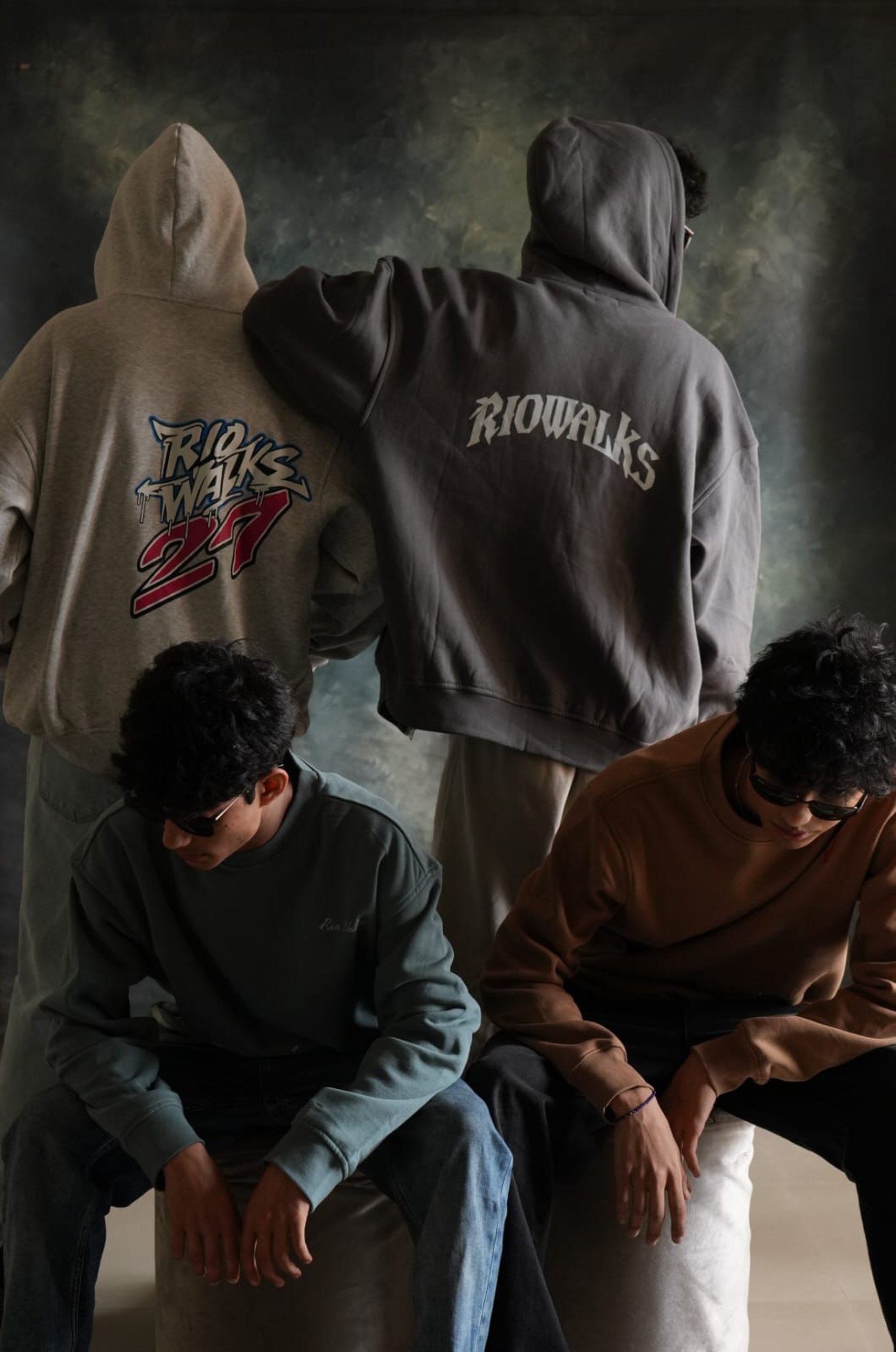 person wearing grey knit sweater