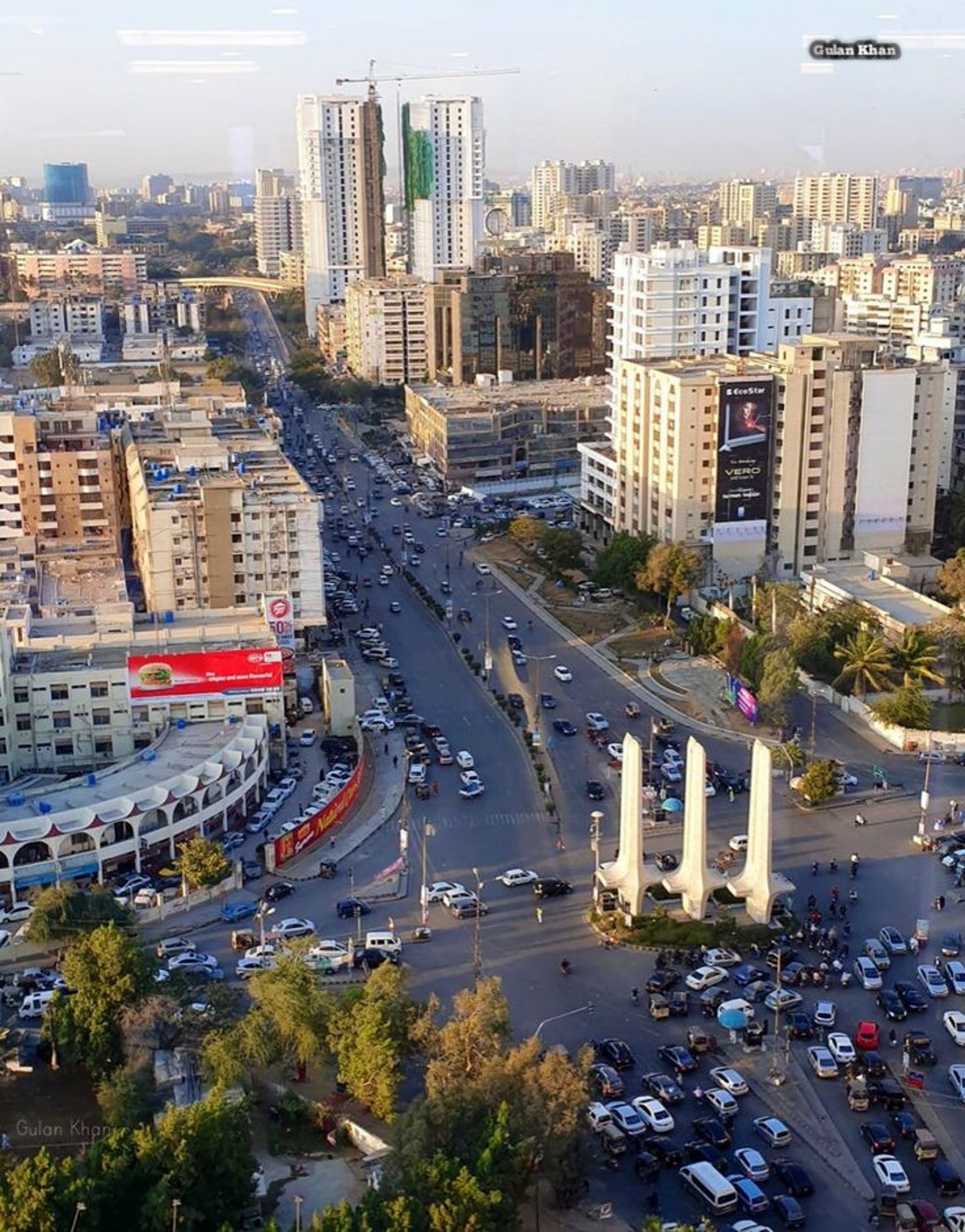 woman wearing yellow long-sleeved dress under white clouds and blue sky during daytime