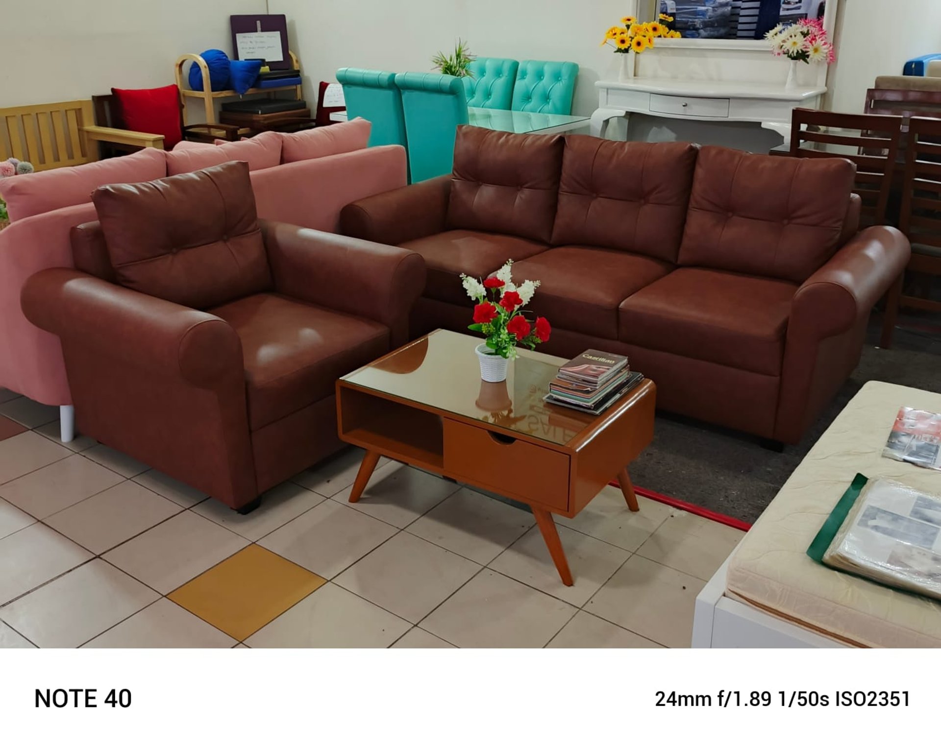 a hallway with a light on the wall