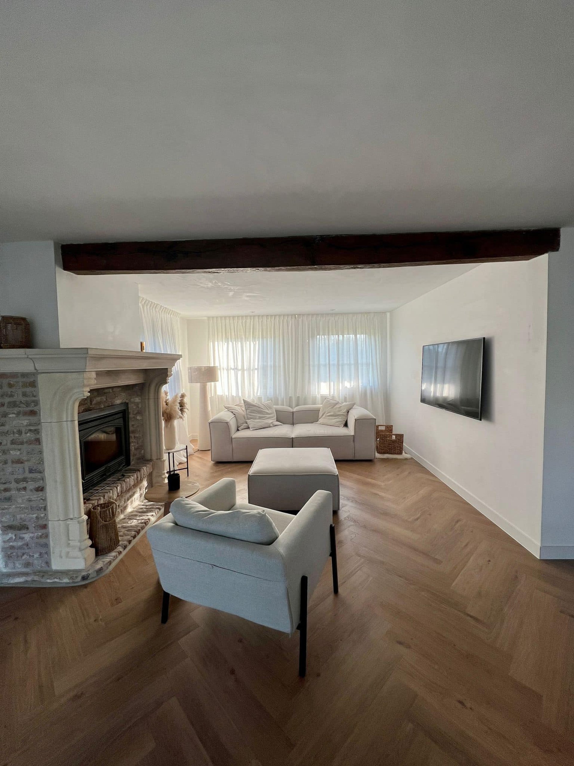 black and brown leather padded tub sofa