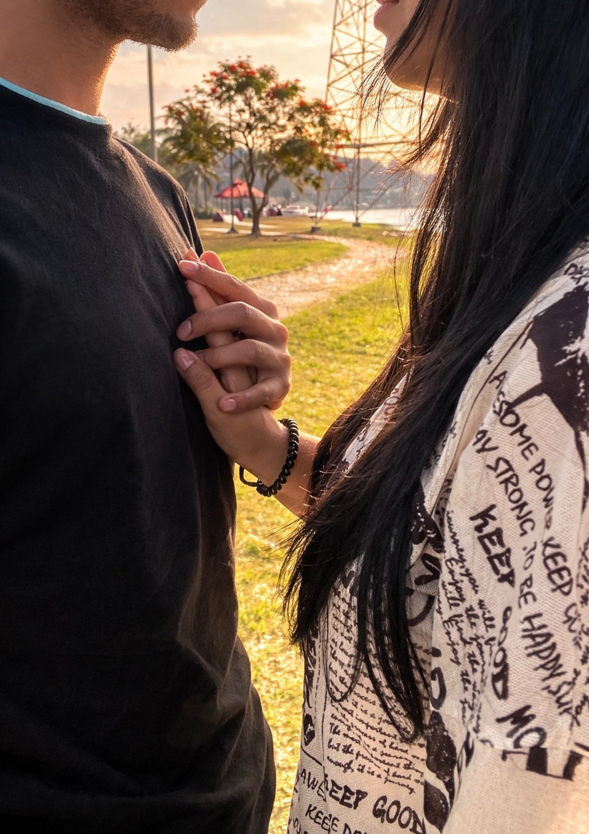 couple wearing silver-colored rings
