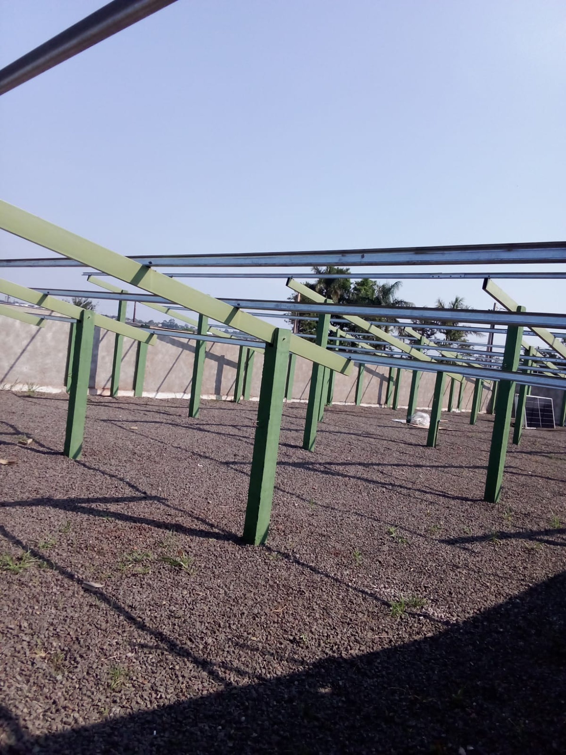 woman wearing yellow long-sleeved dress under white clouds and blue sky during daytime
