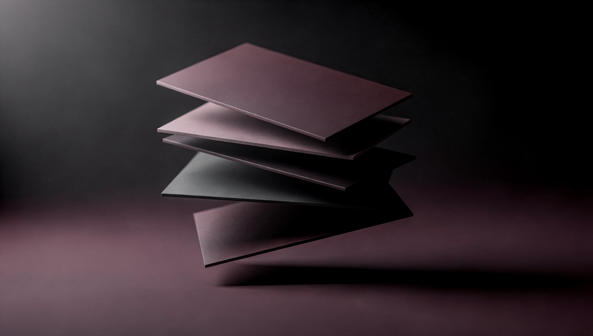 an abstract photo of a curved building with a blue sky in the background