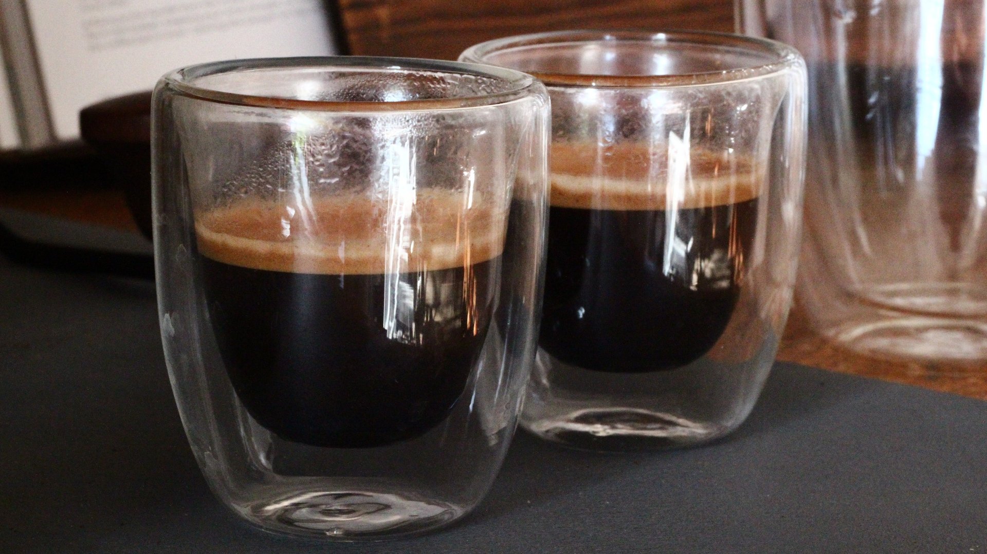 person wearing grey knit sweater