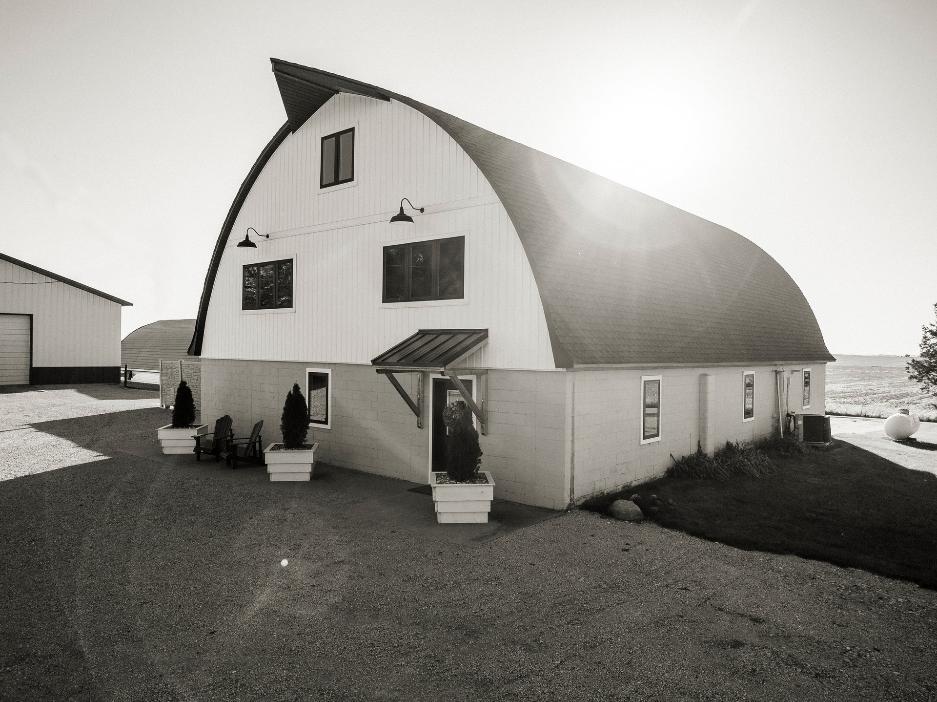 woman wearing yellow long-sleeved dress under white clouds and blue sky during daytime