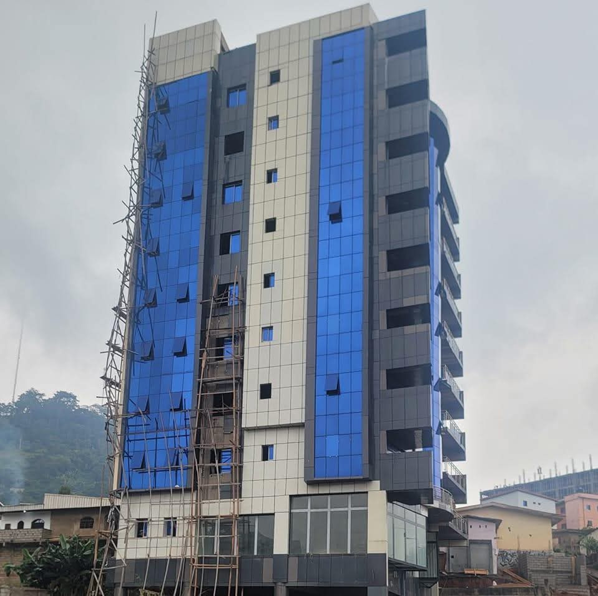 black and brown leather padded tub sofa