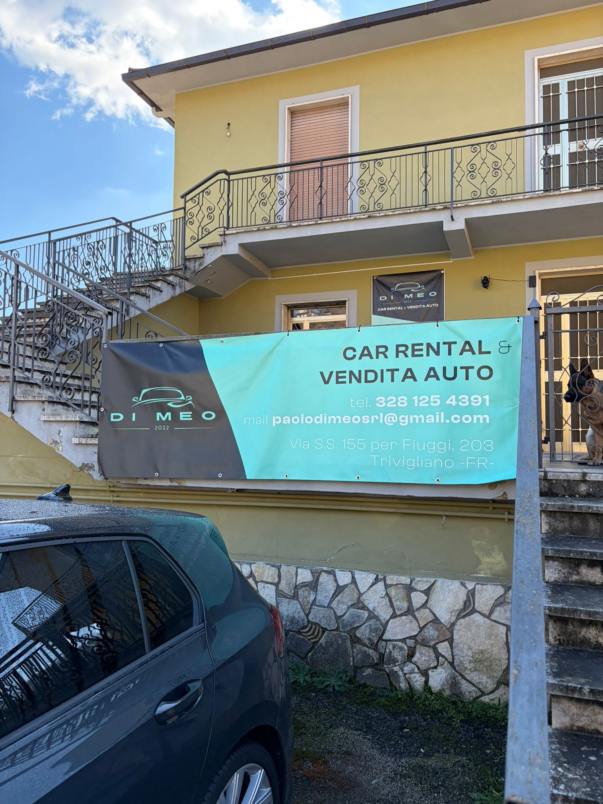 man driving a car wearing wrist watch