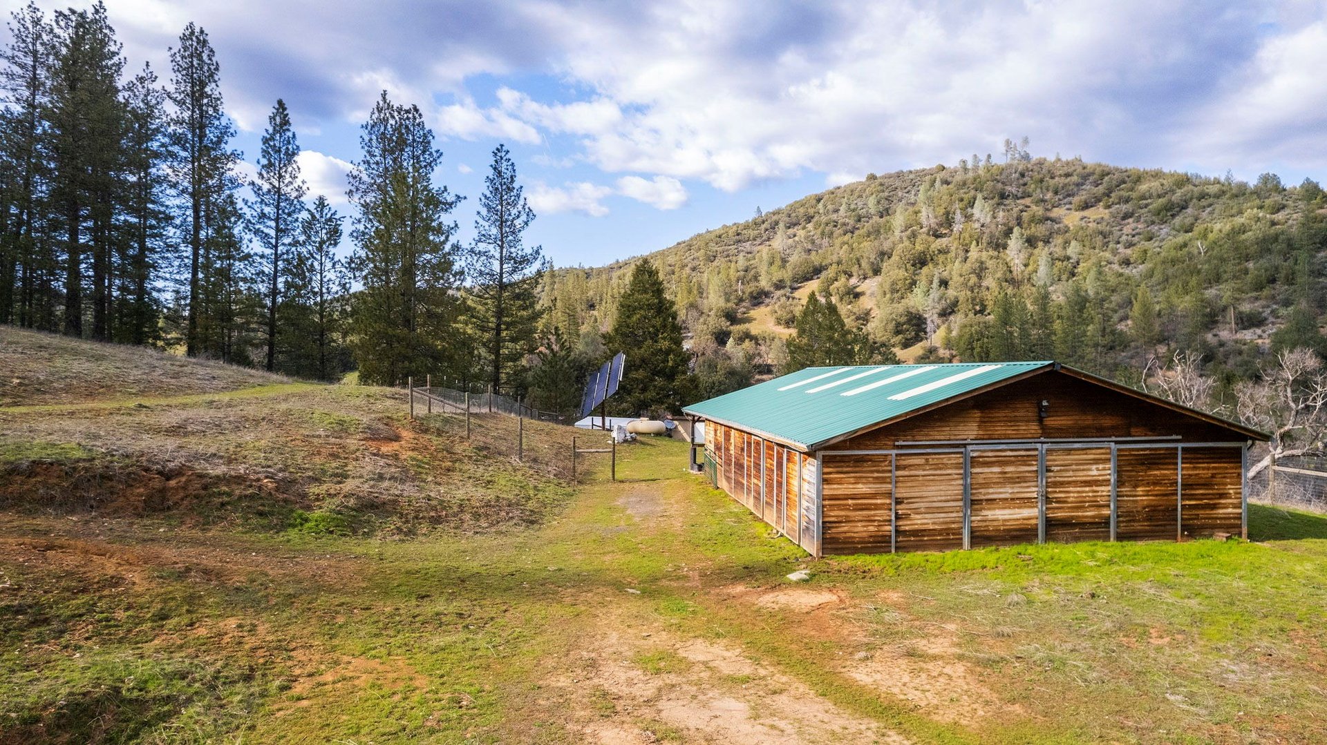 an abstract photo of a curved building with a blue sky in the background
