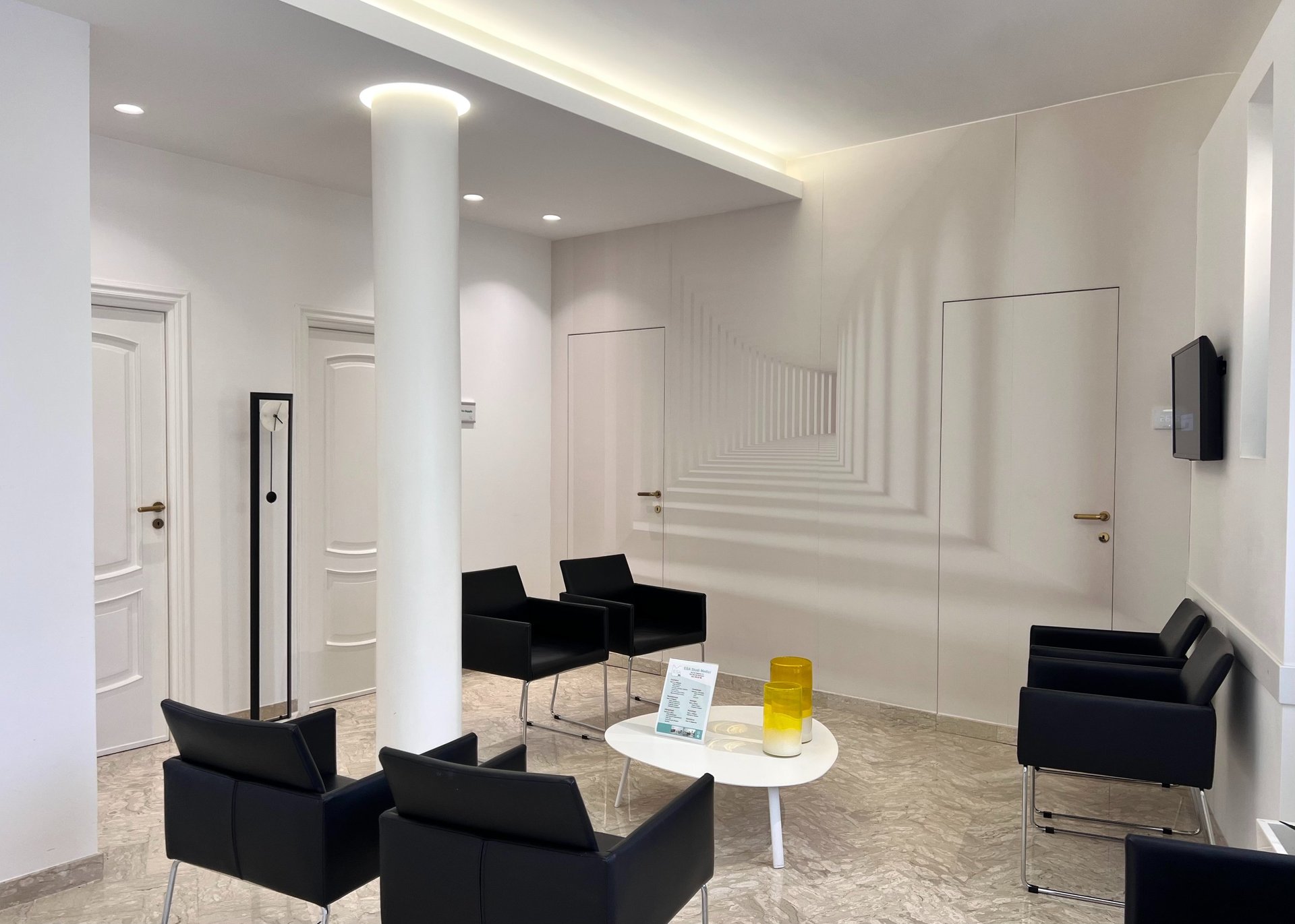 an abstract photo of a curved building with a blue sky in the background