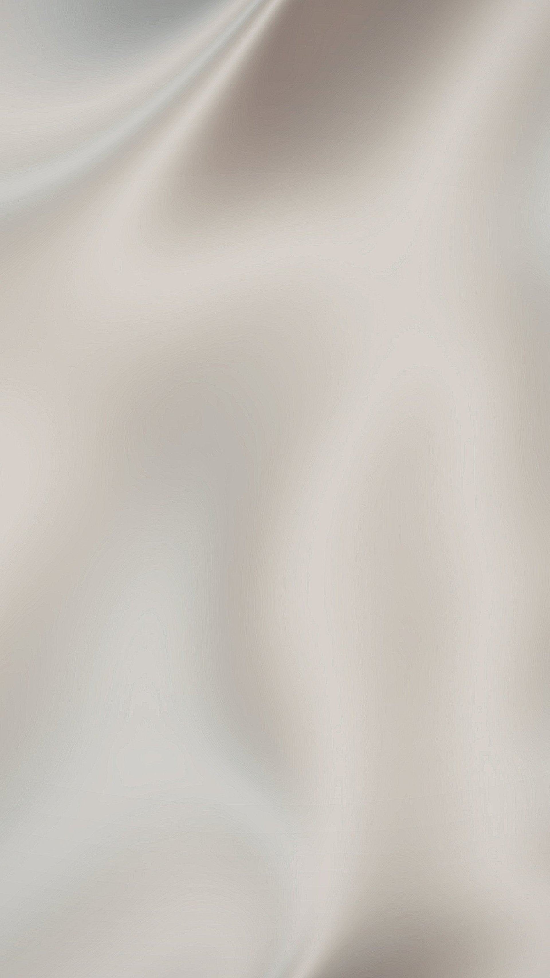 white textile on brown wooden table