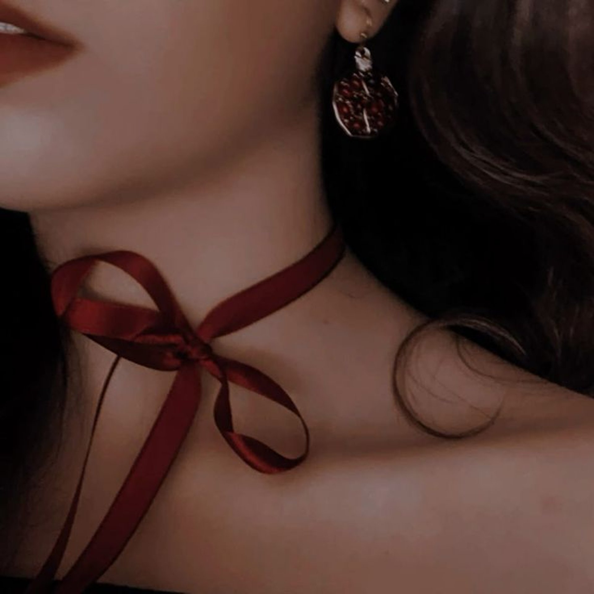 an abstract photo of a curved building with a blue sky in the background