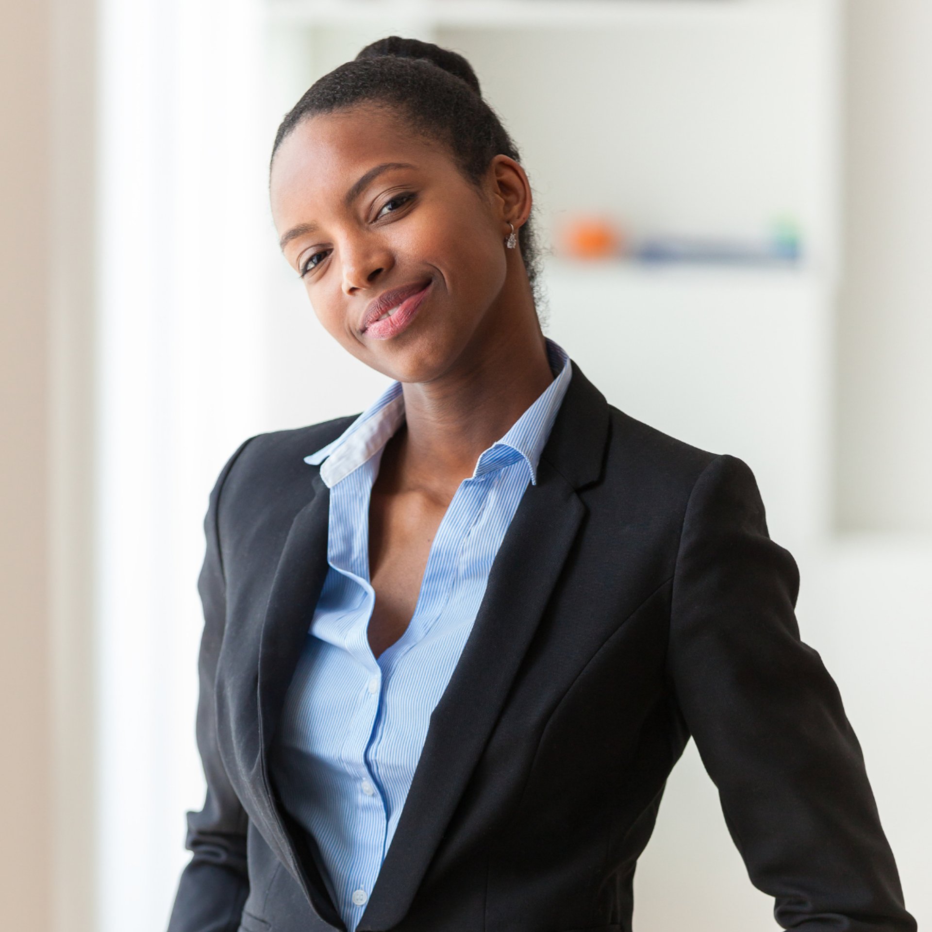 black and brown leather padded tub sofa