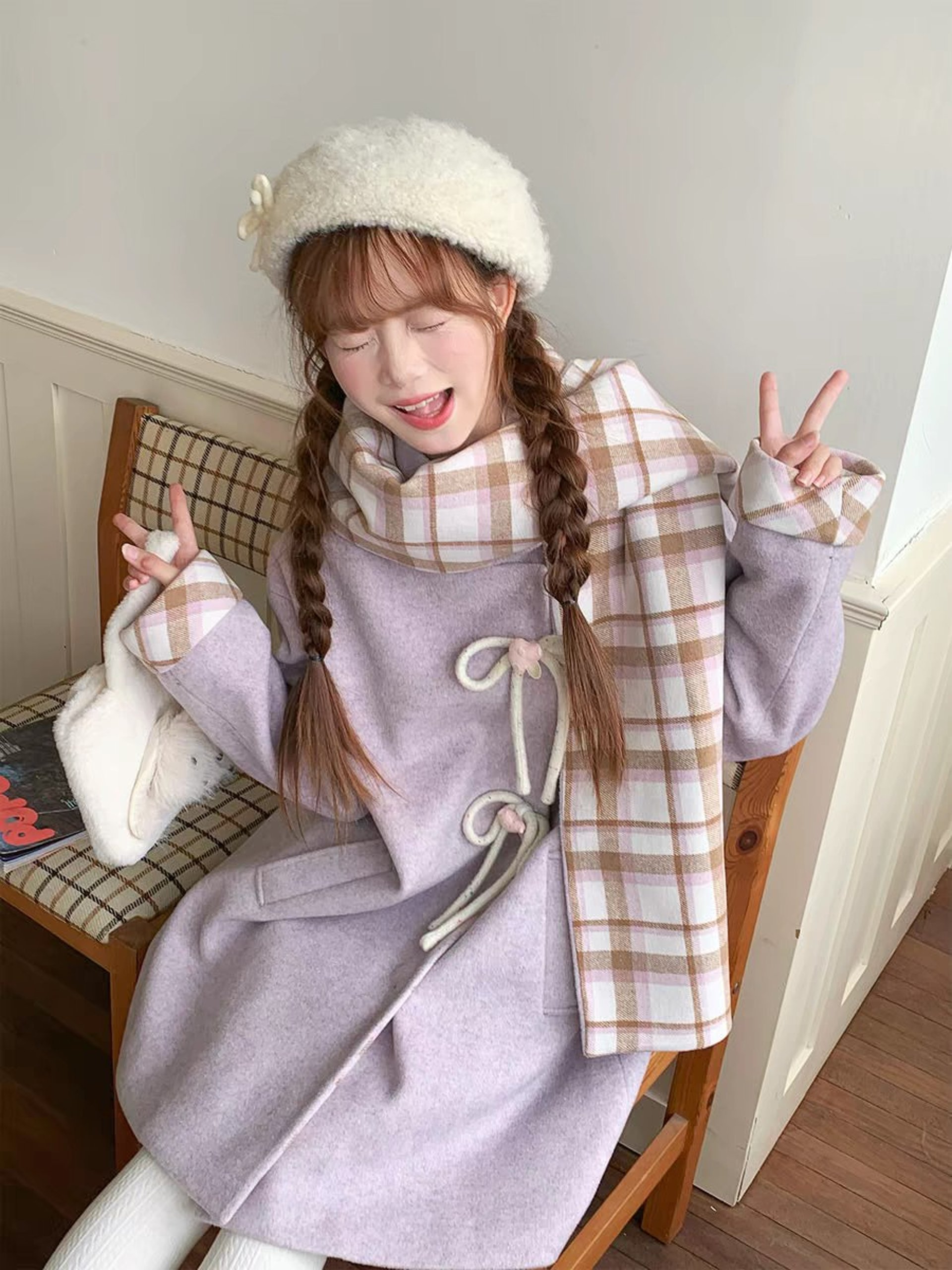 woman wearing yellow long-sleeved dress under white clouds and blue sky during daytime