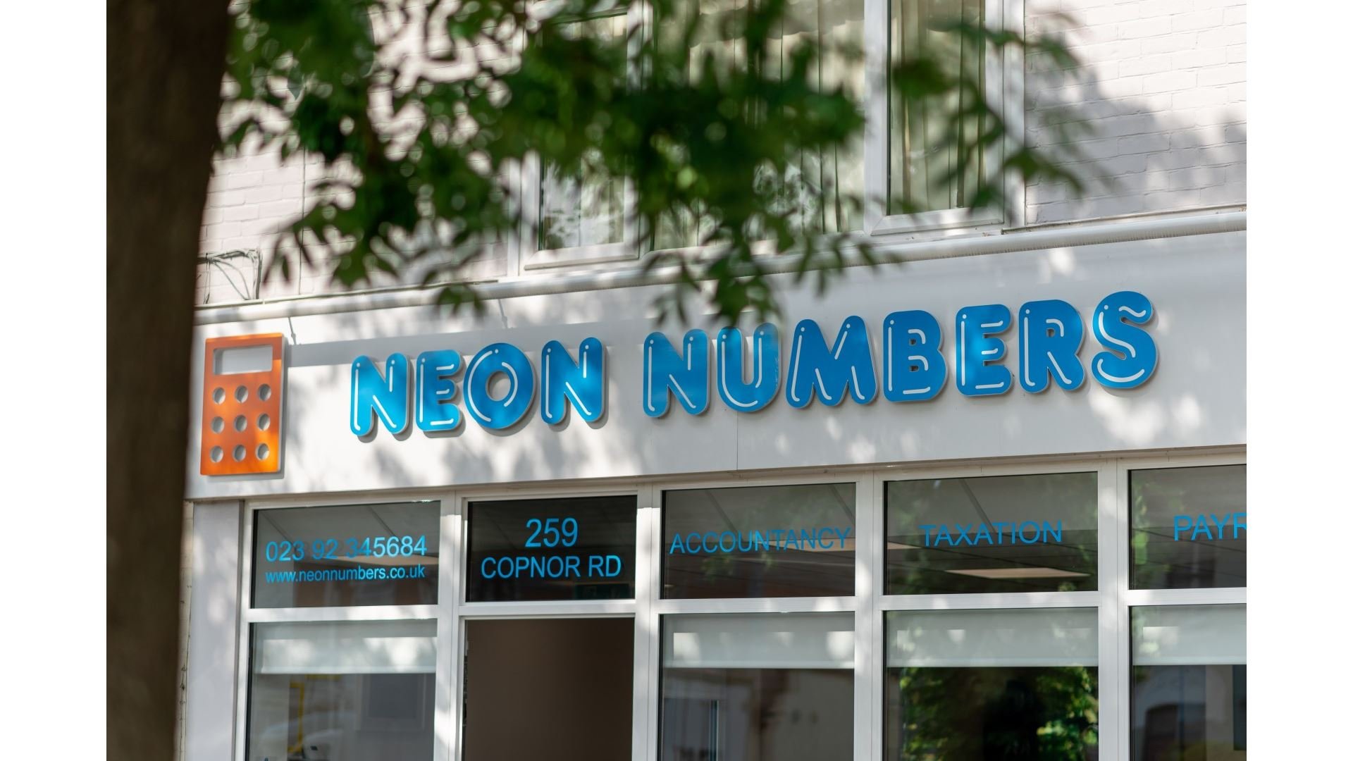 a white calculator sitting on top of a table