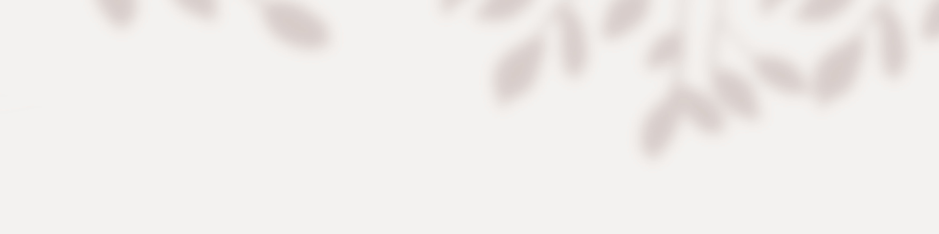 white tissue paper roll beside clear glass vase