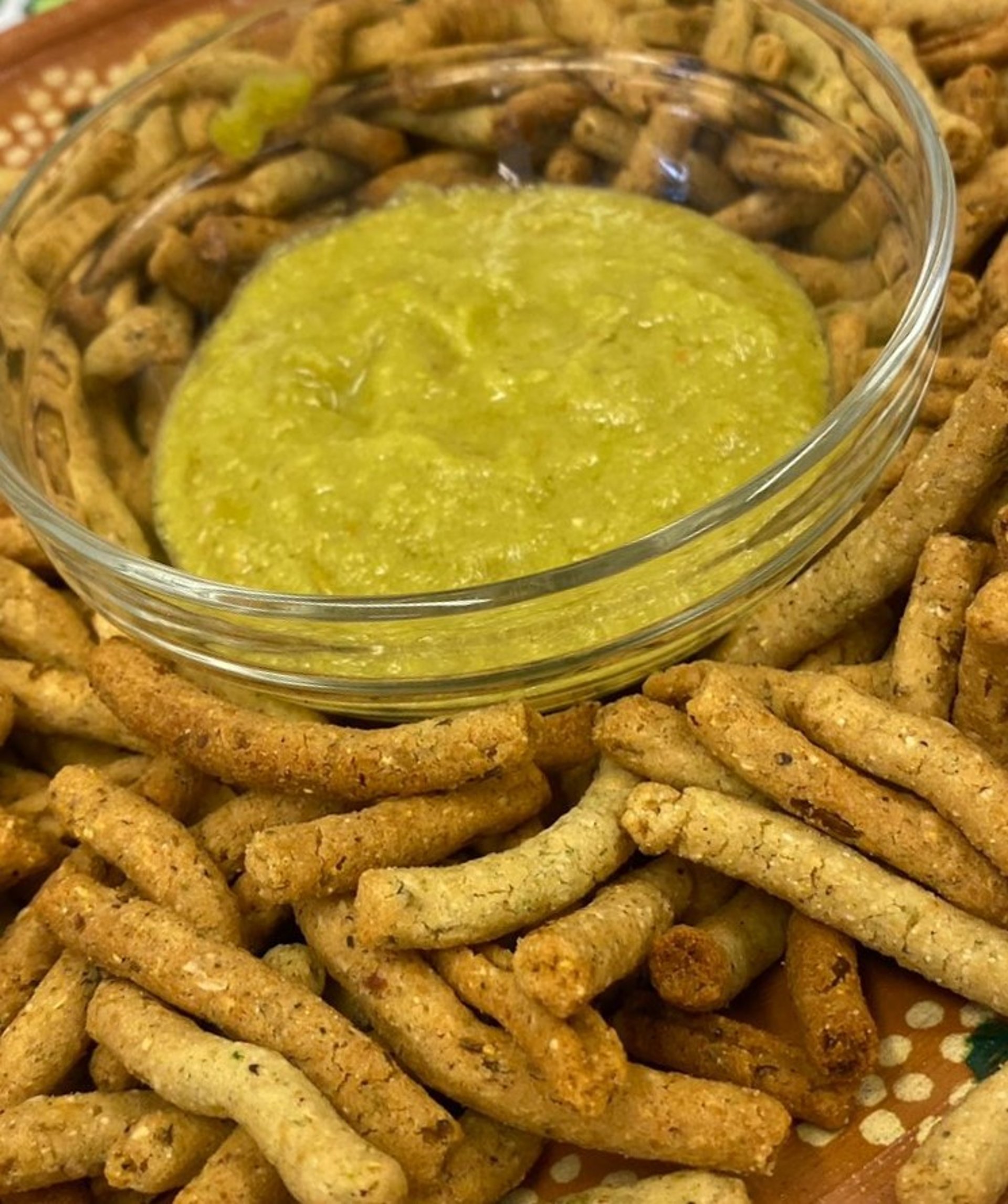 person wearing grey knit sweater