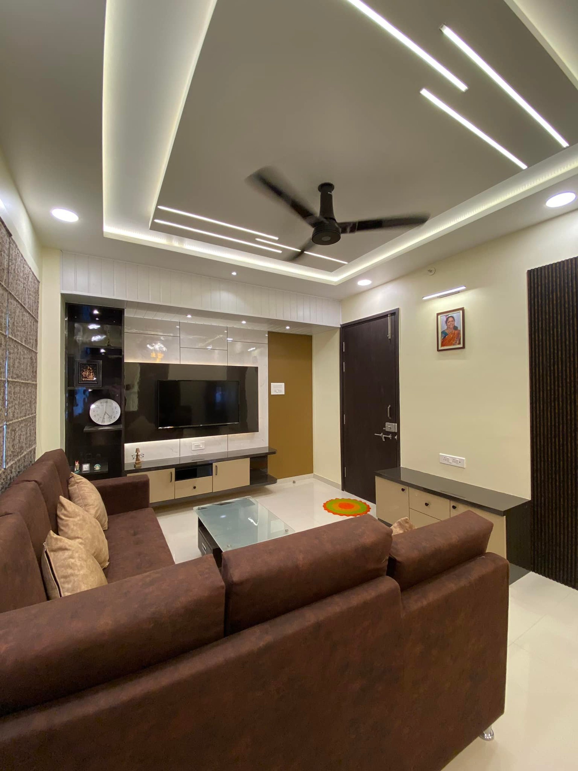 black and brown leather padded tub sofa