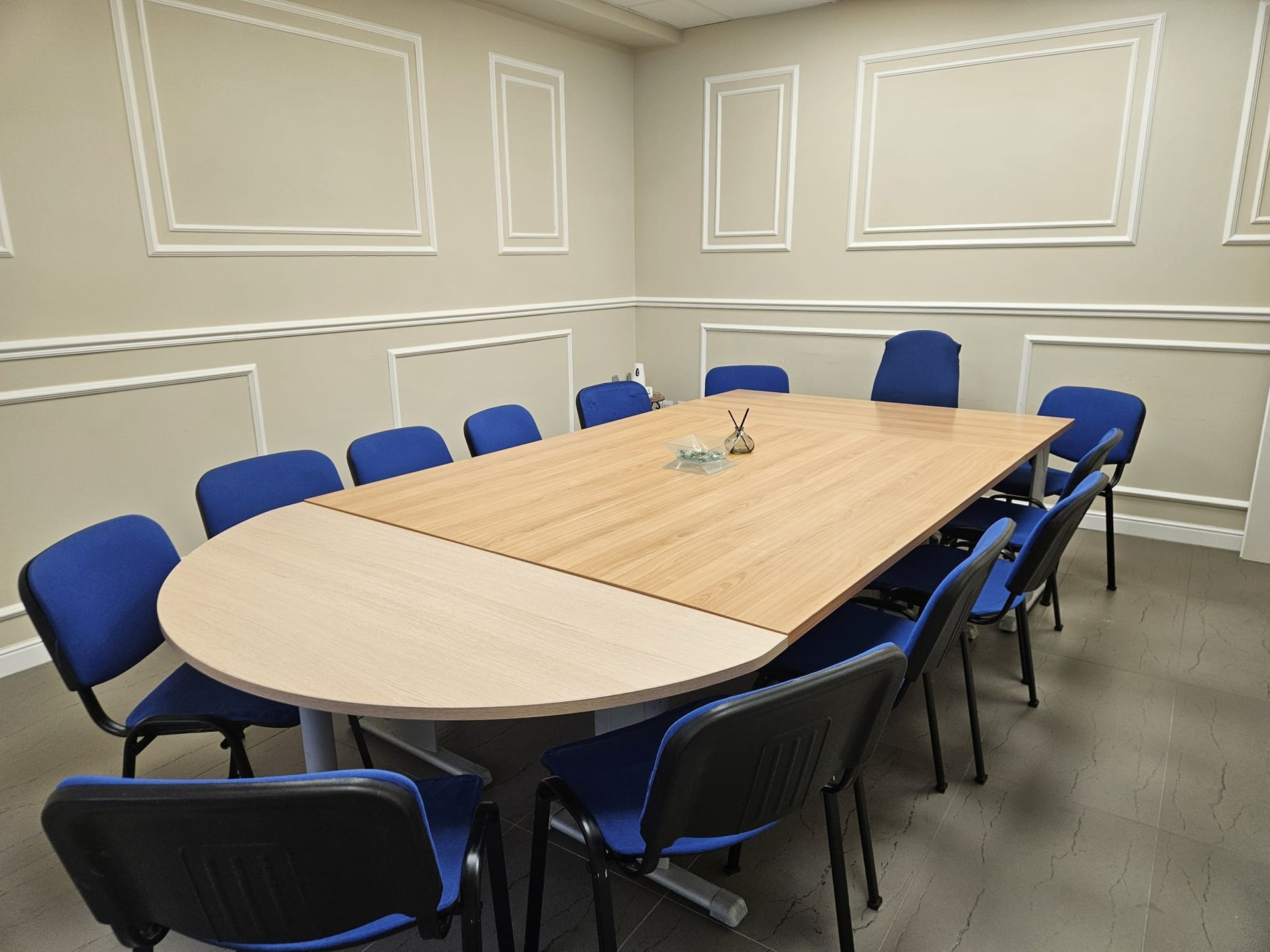an abstract photo of a curved building with a blue sky in the background