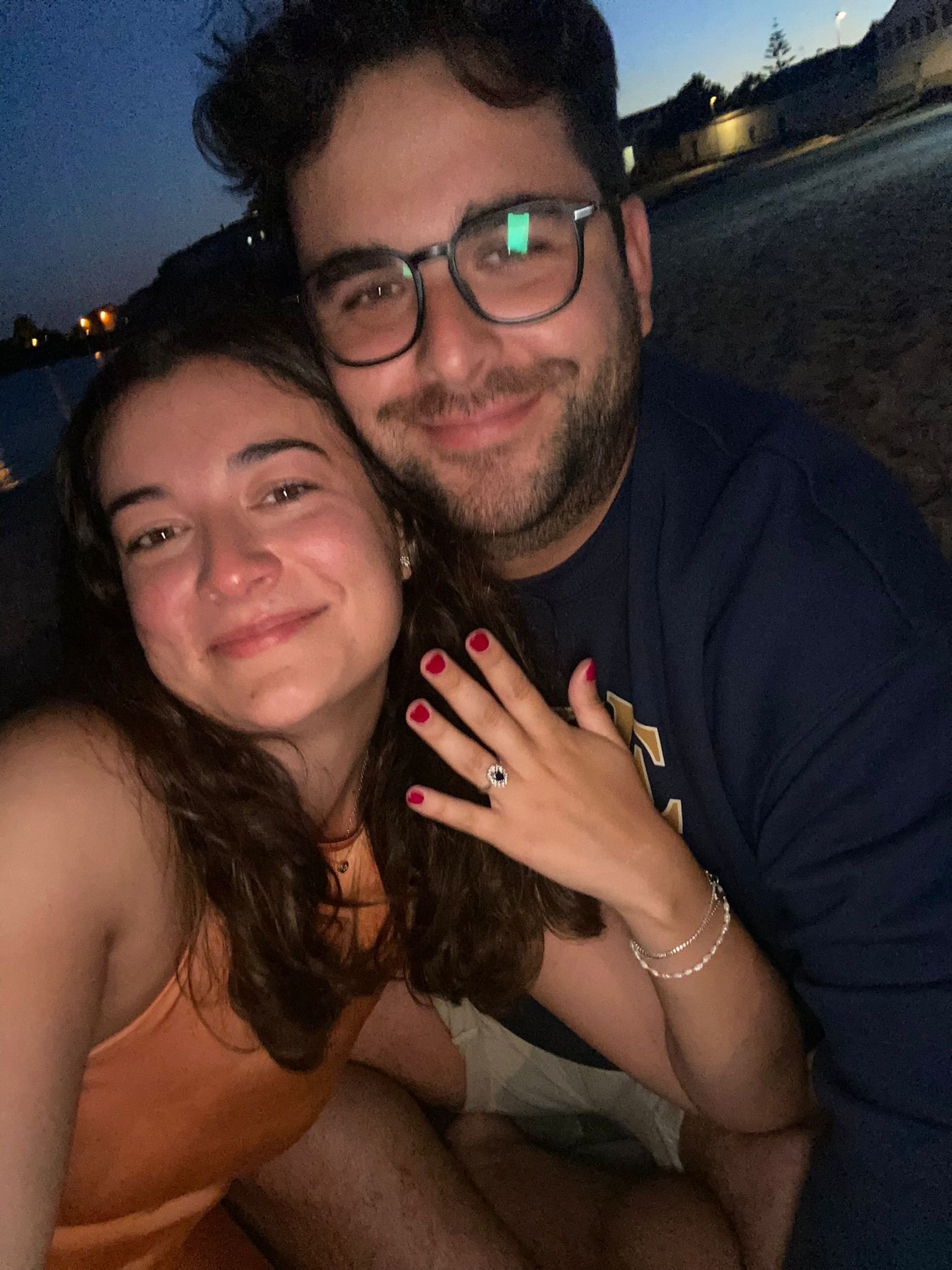 couple wearing silver-colored rings