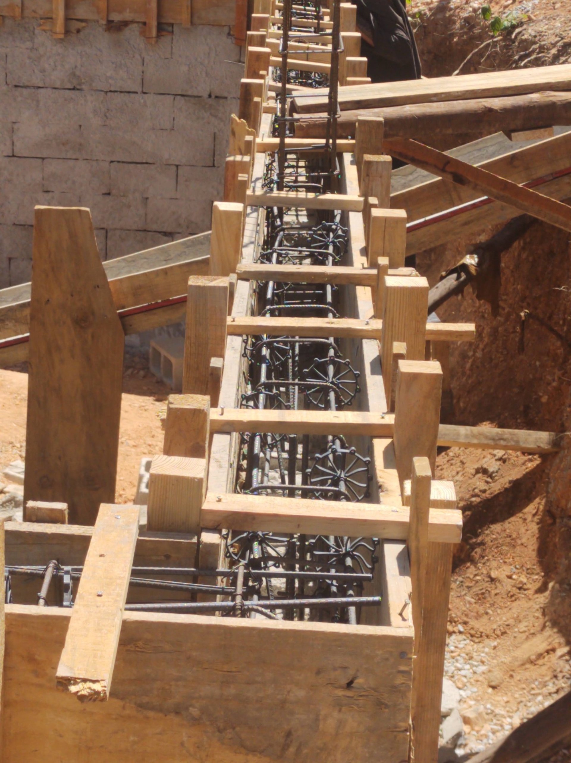 woman wearing yellow long-sleeved dress under white clouds and blue sky during daytime
