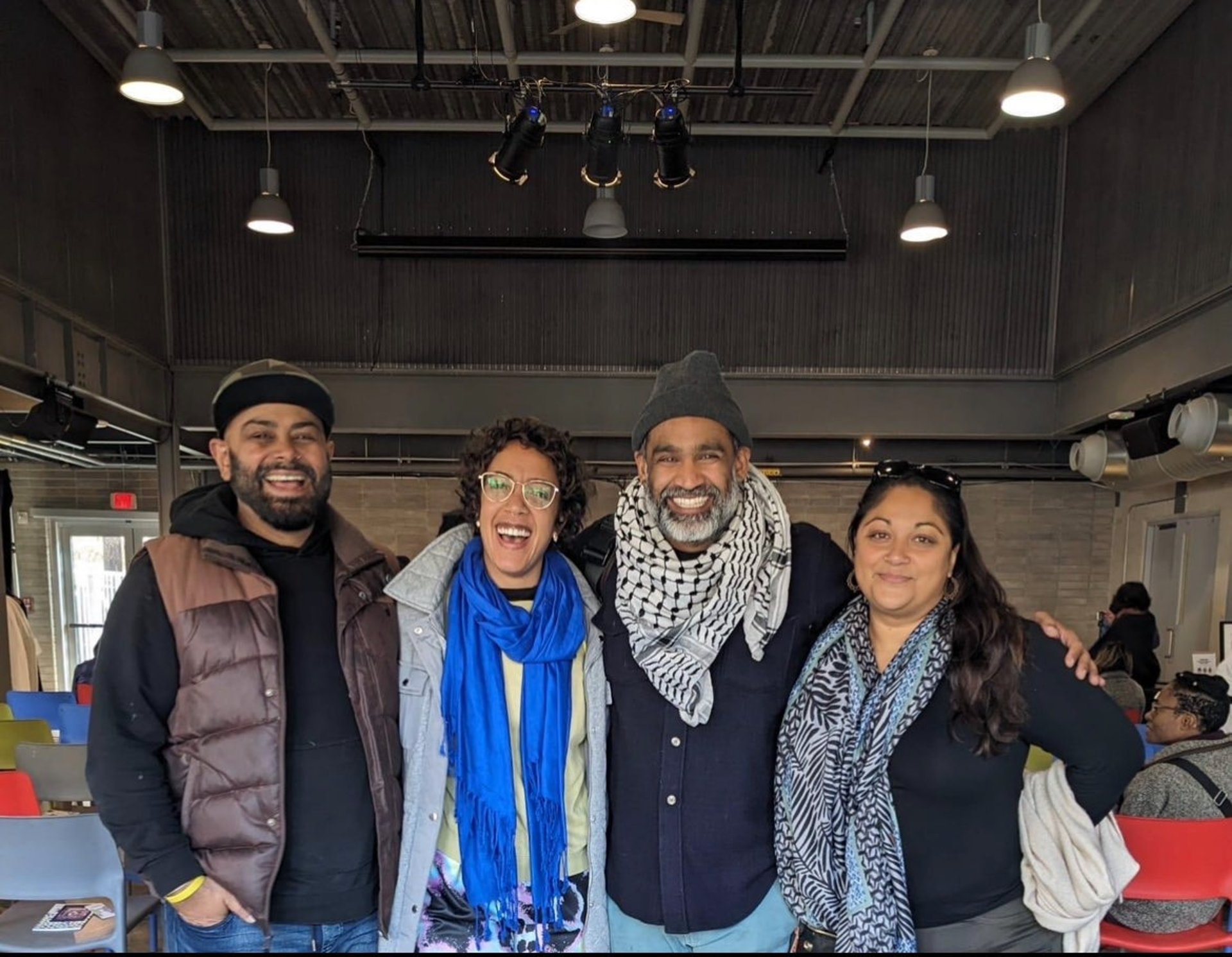 an abstract photo of a curved building with a blue sky in the background