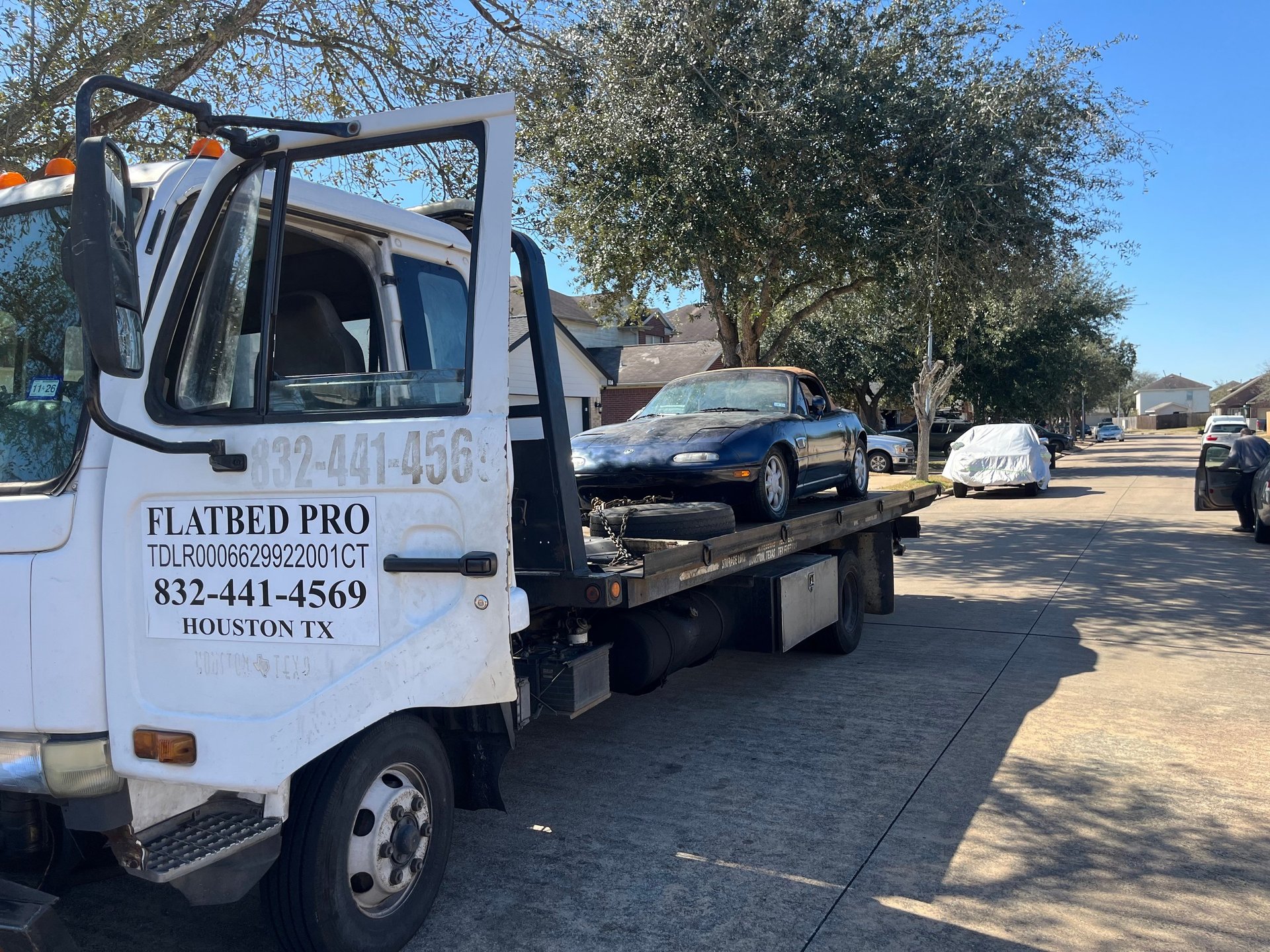 woman wearing yellow long-sleeved dress under white clouds and blue sky during daytime