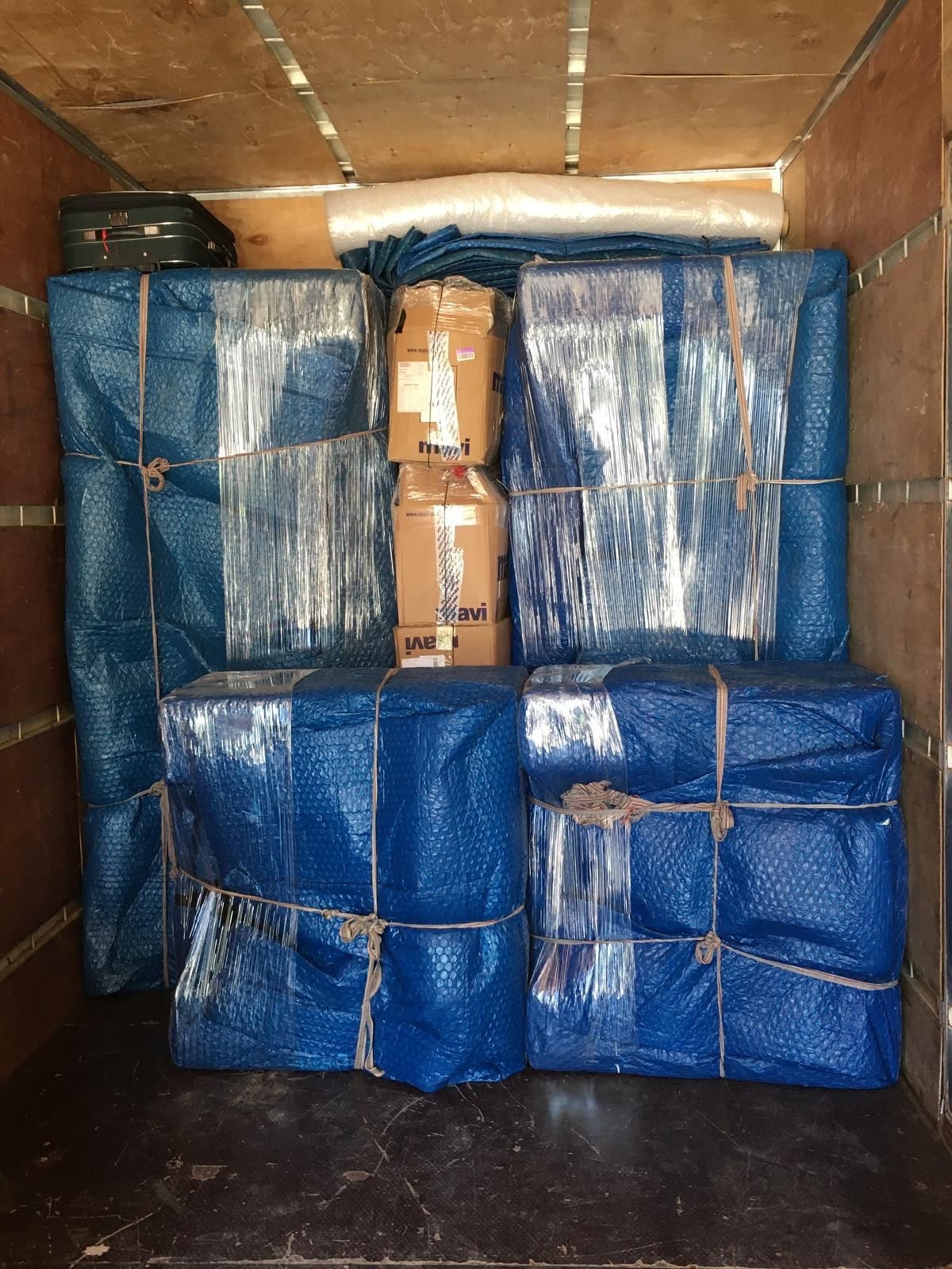 woman wearing yellow long-sleeved dress under white clouds and blue sky during daytime