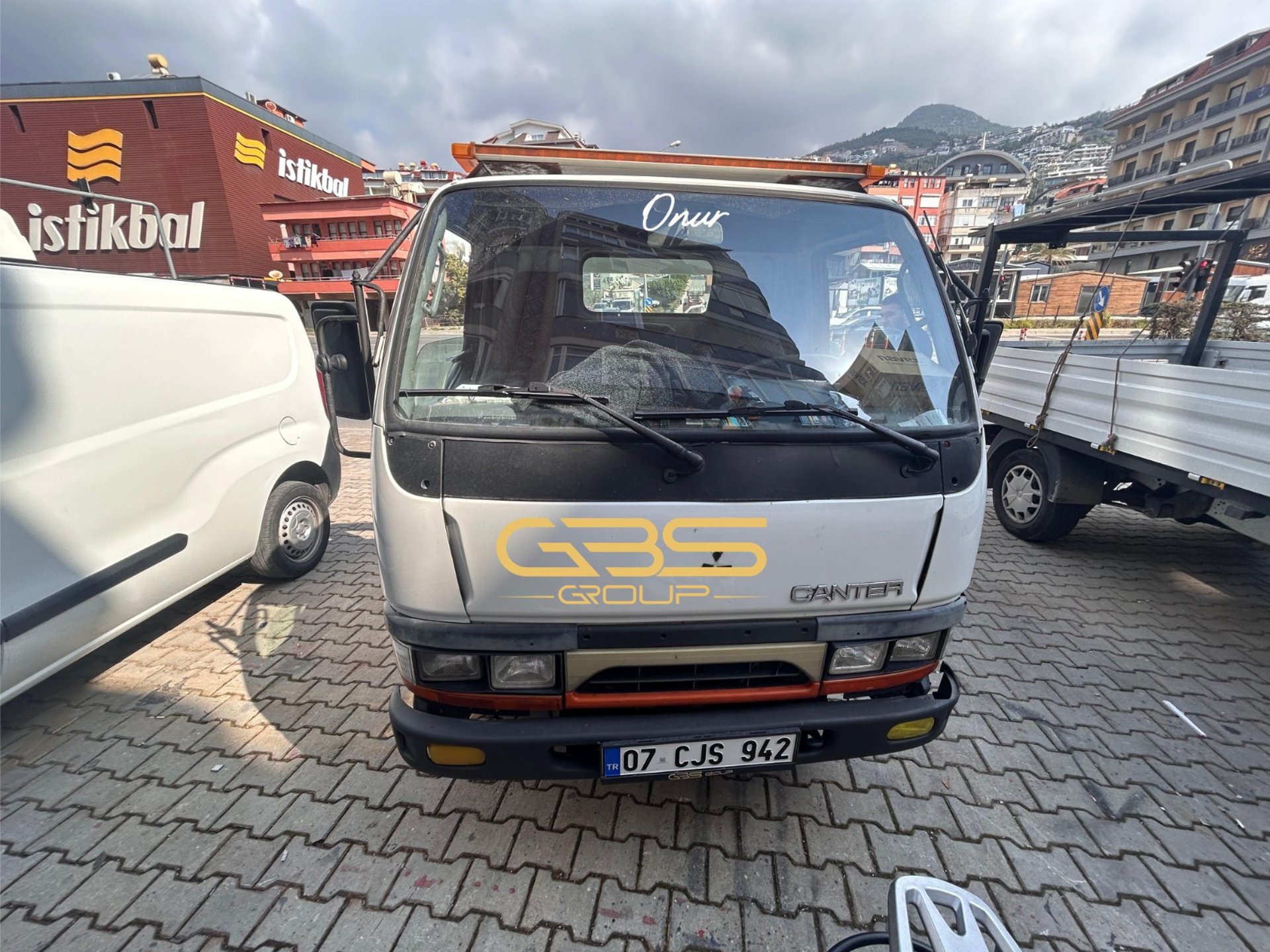 black and brown leather padded tub sofa