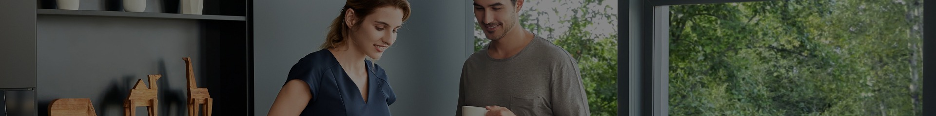 an abstract photo of a curved building with a blue sky in the background