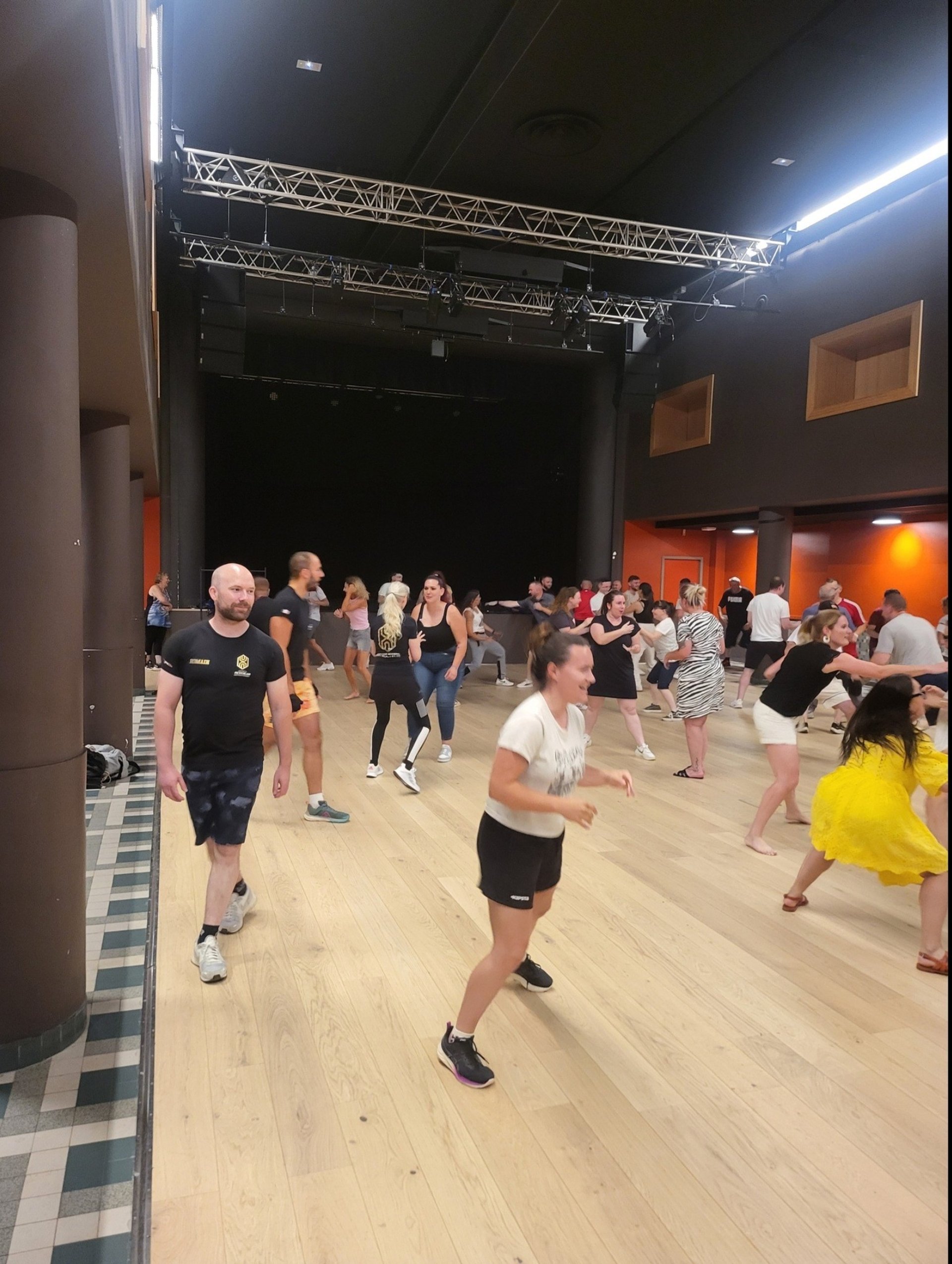 black and brown leather padded tub sofa