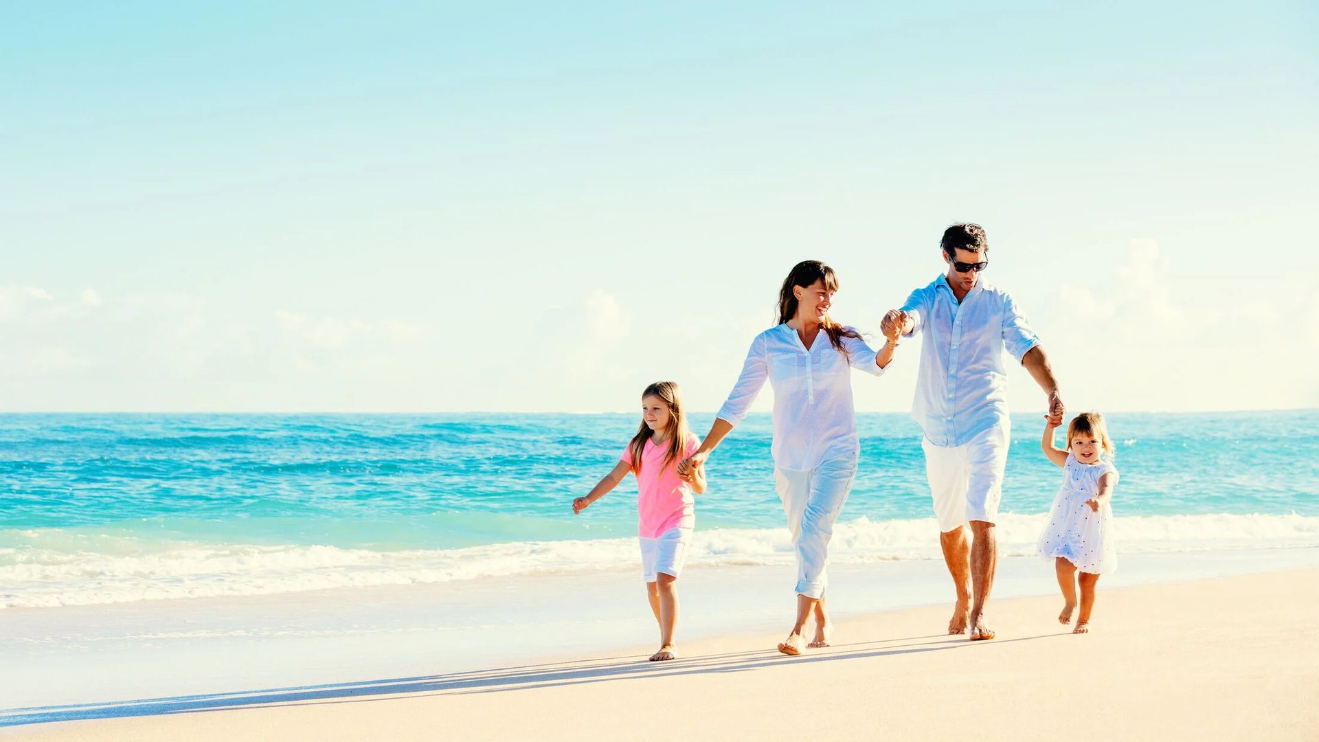 brown concrete building near body of water during daytime