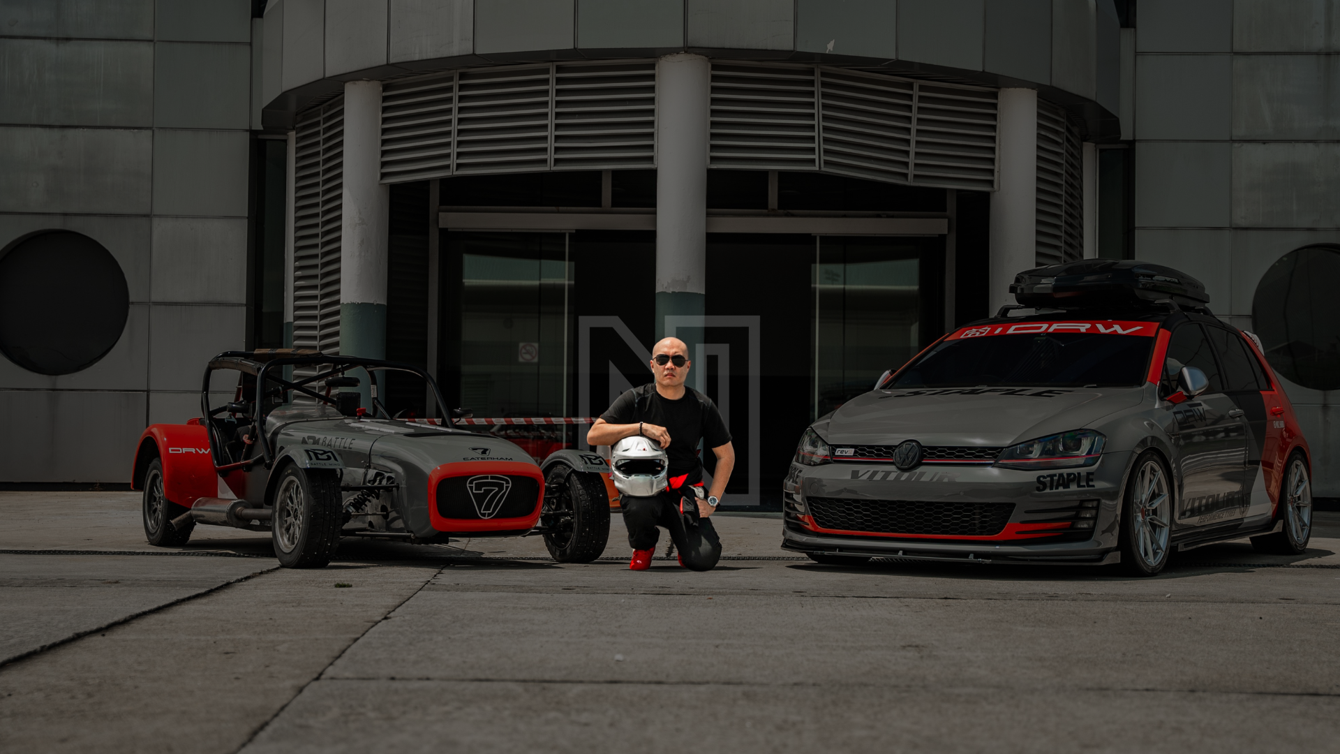 an abstract photo of a curved building with a blue sky in the background