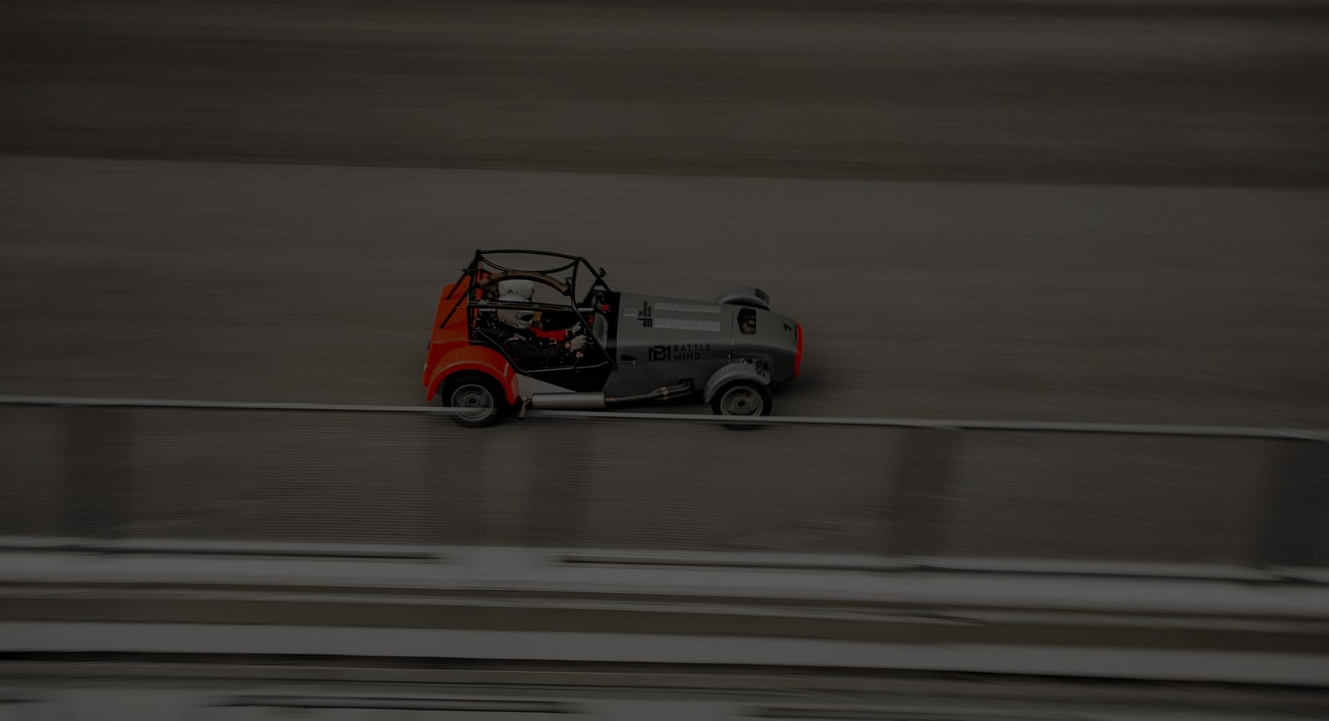 an abstract photo of a curved building with a blue sky in the background