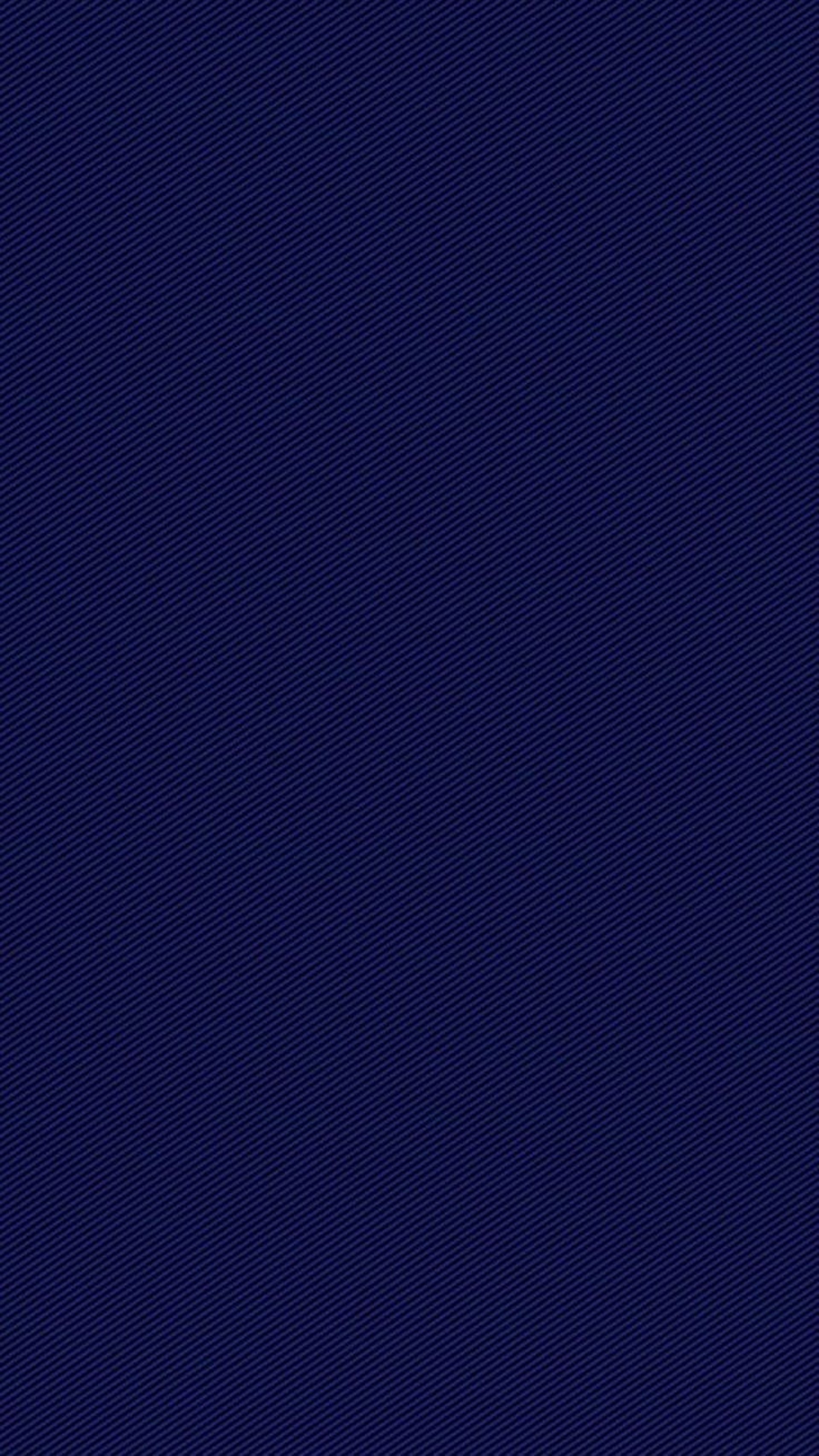 a tall building with balconies on the top of it