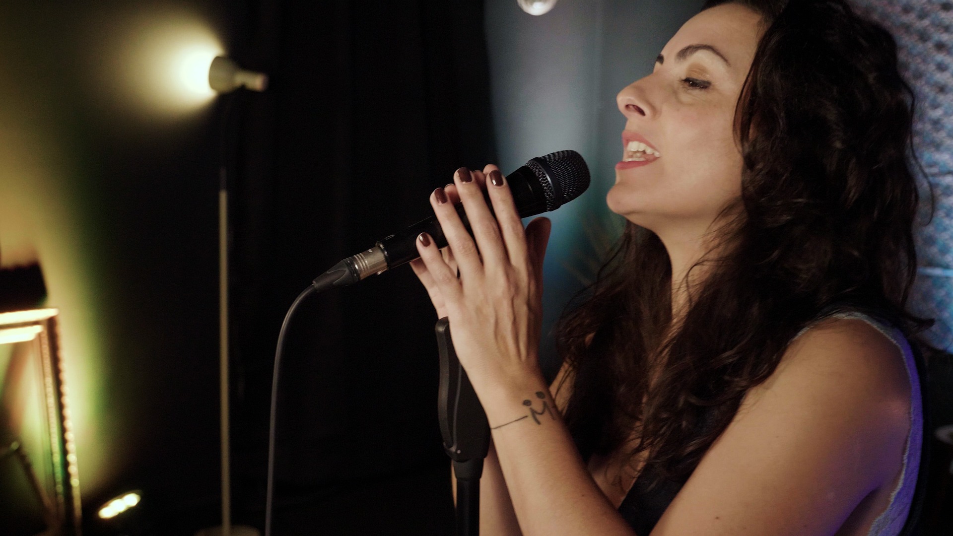 a close up of a black and brown abstract painting