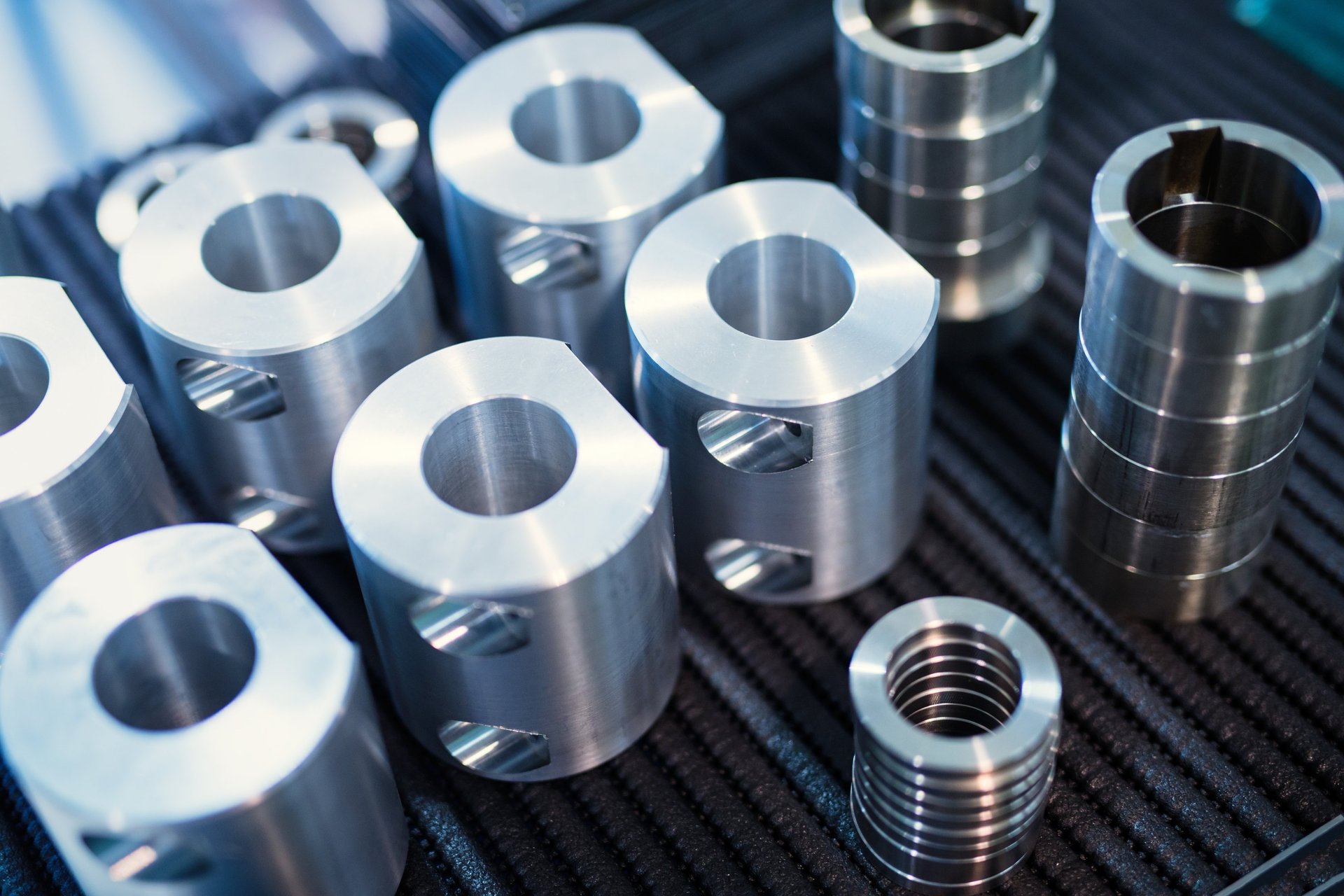 an abstract photo of a curved building with a blue sky in the background
