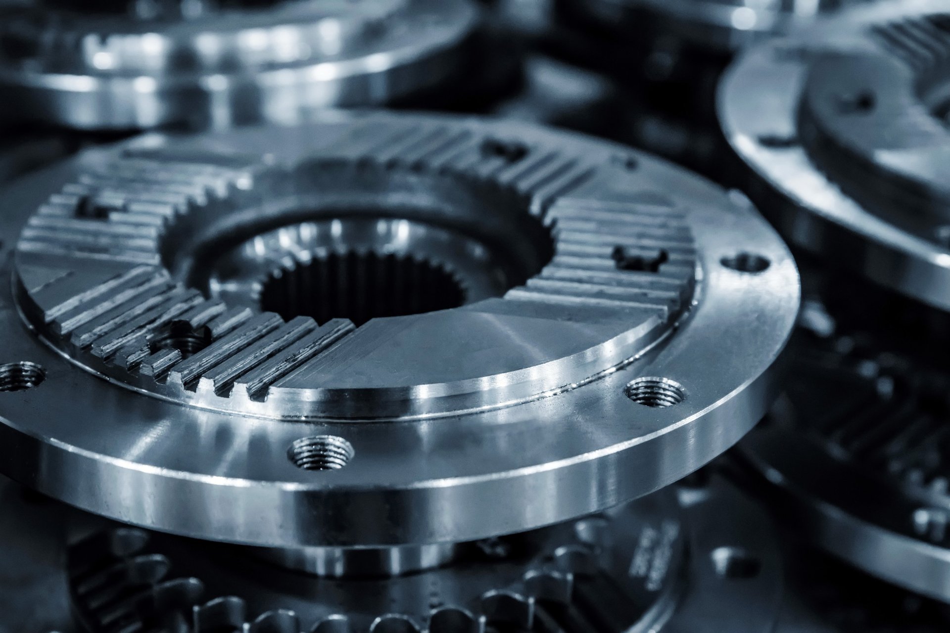 an abstract photo of a curved building with a blue sky in the background