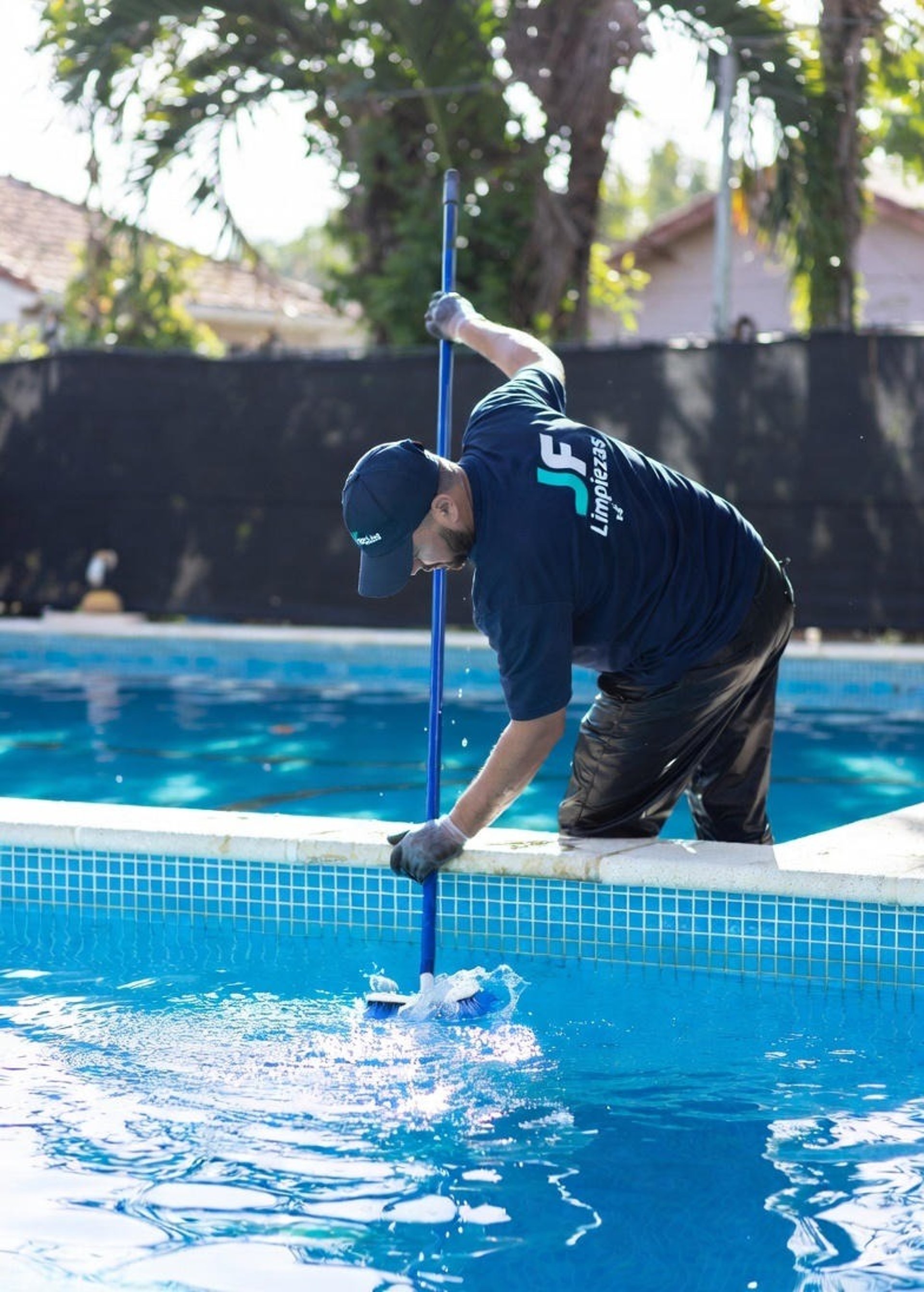 black and brown leather padded tub sofa