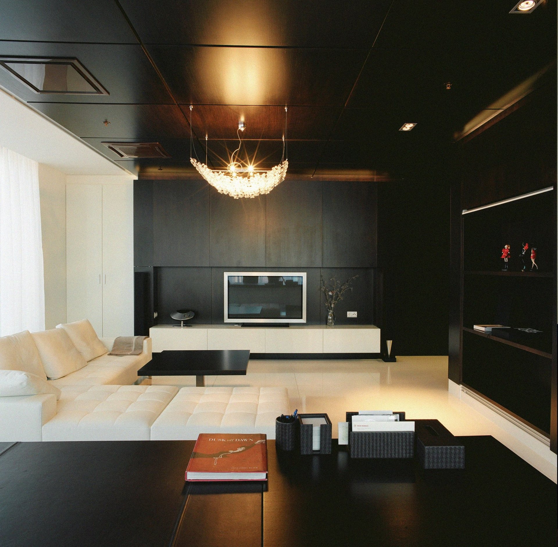 a close up of a black and brown abstract painting