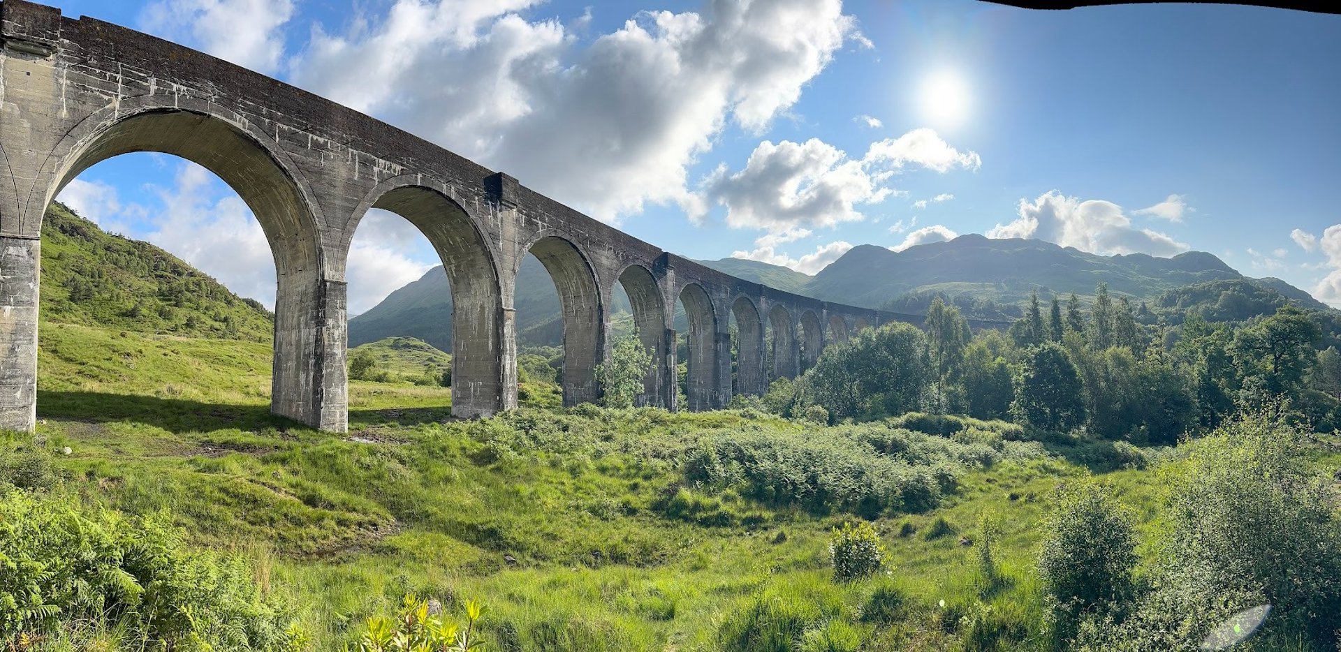 black and brown leather padded tub sofa