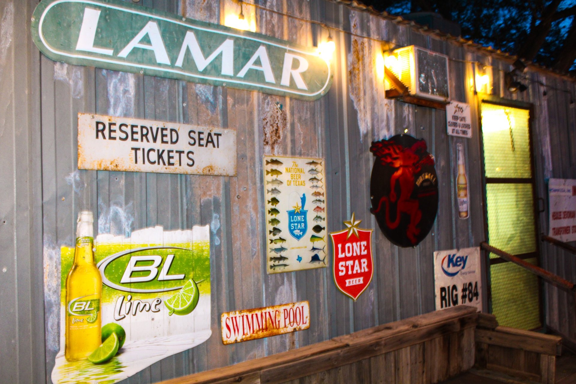an abstract photo of a curved building with a blue sky in the background