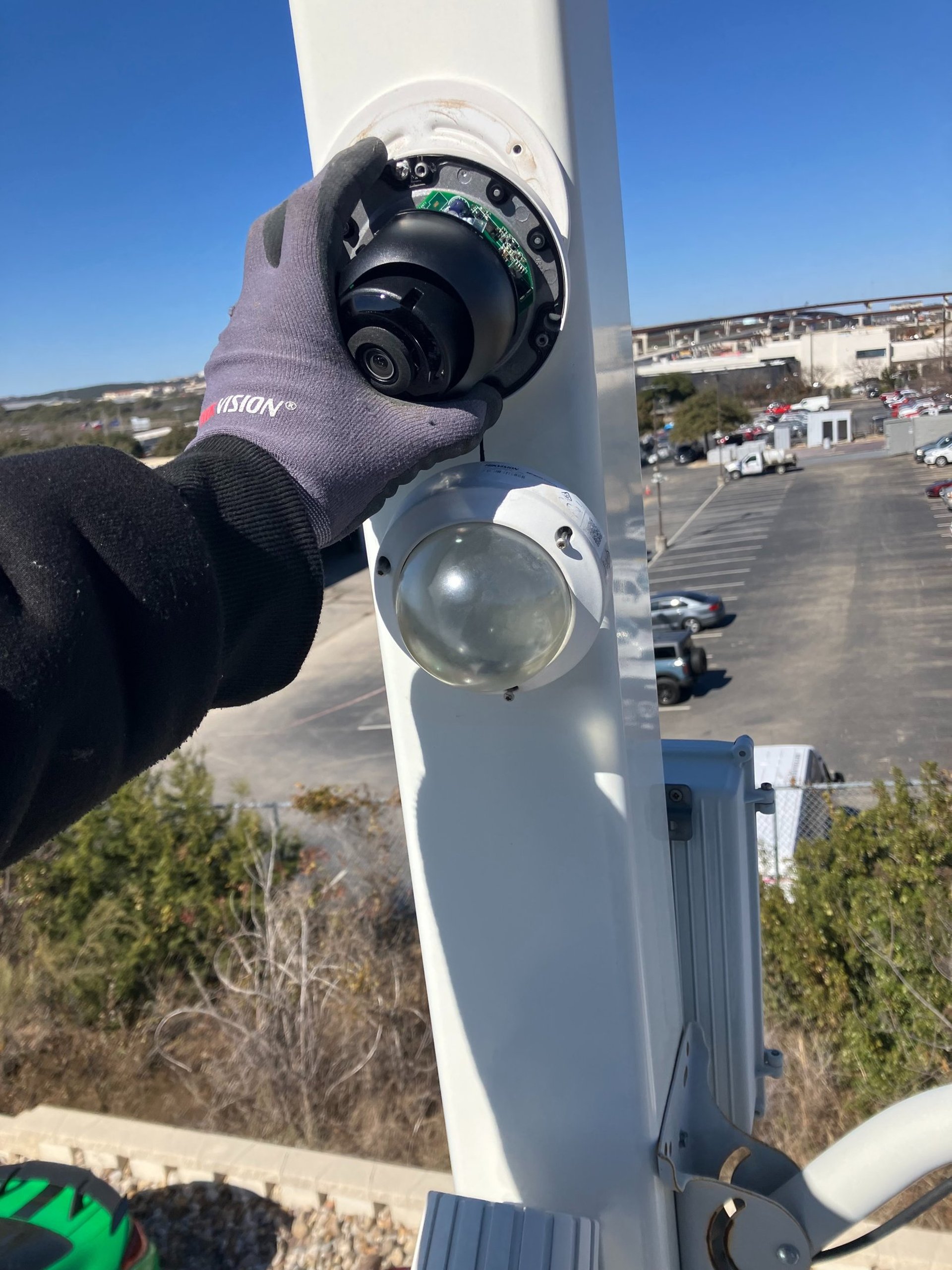 Camera being installed on light pole