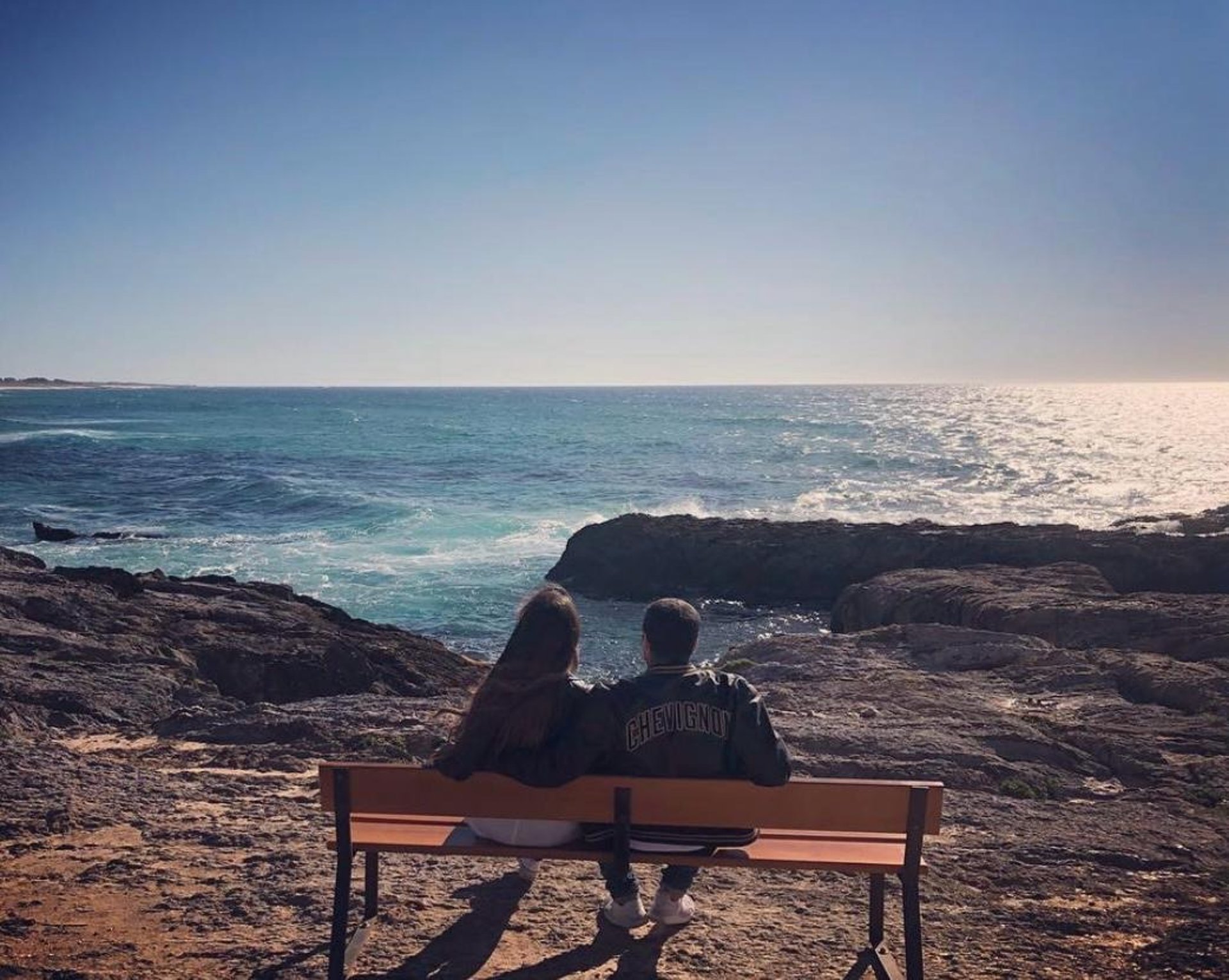 couple wearing silver-colored rings