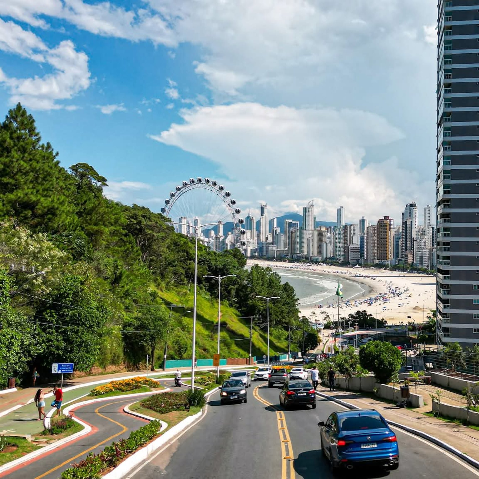 woman wearing yellow long-sleeved dress under white clouds and blue sky during daytime