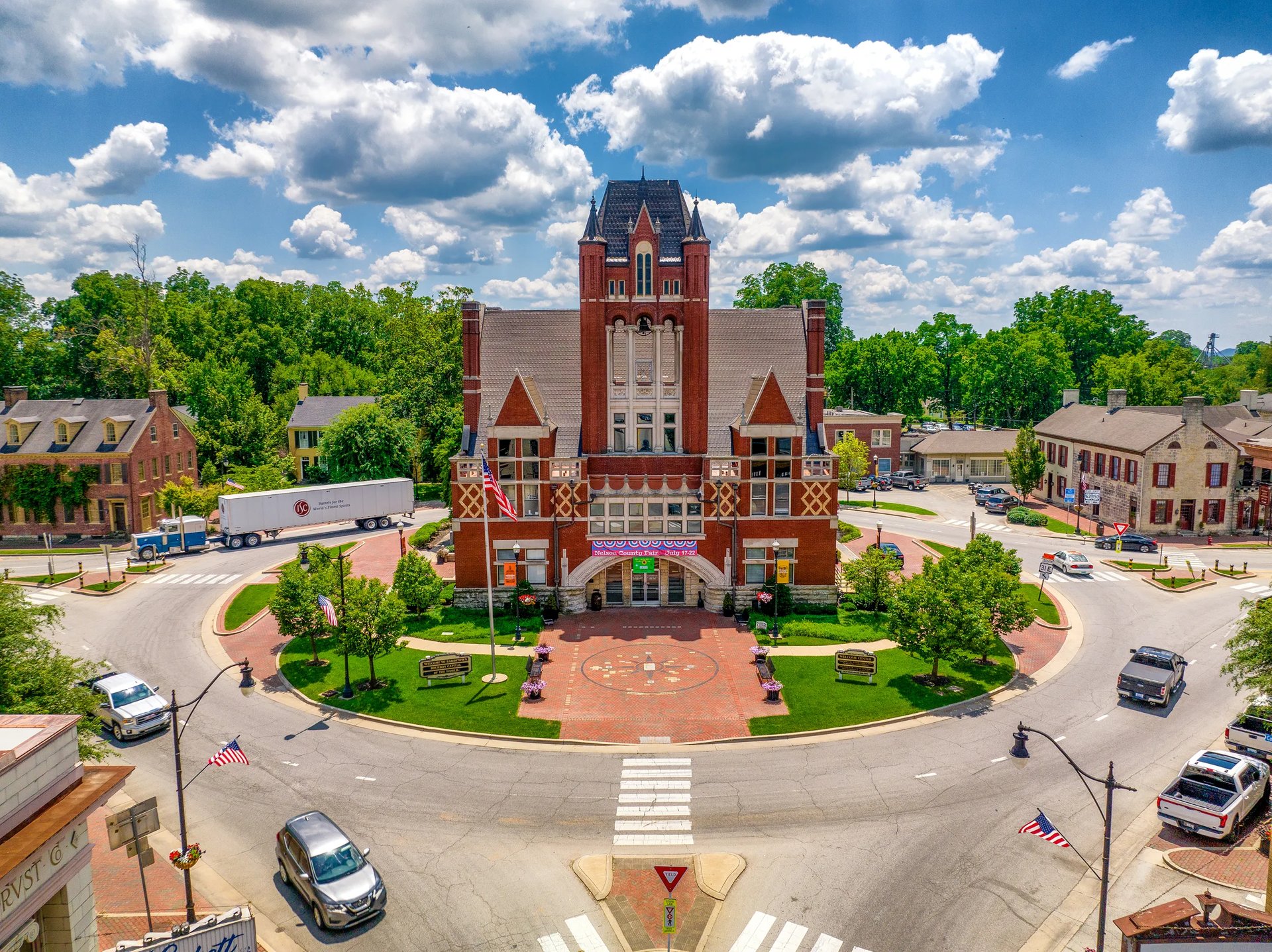black and brown leather padded tub sofa